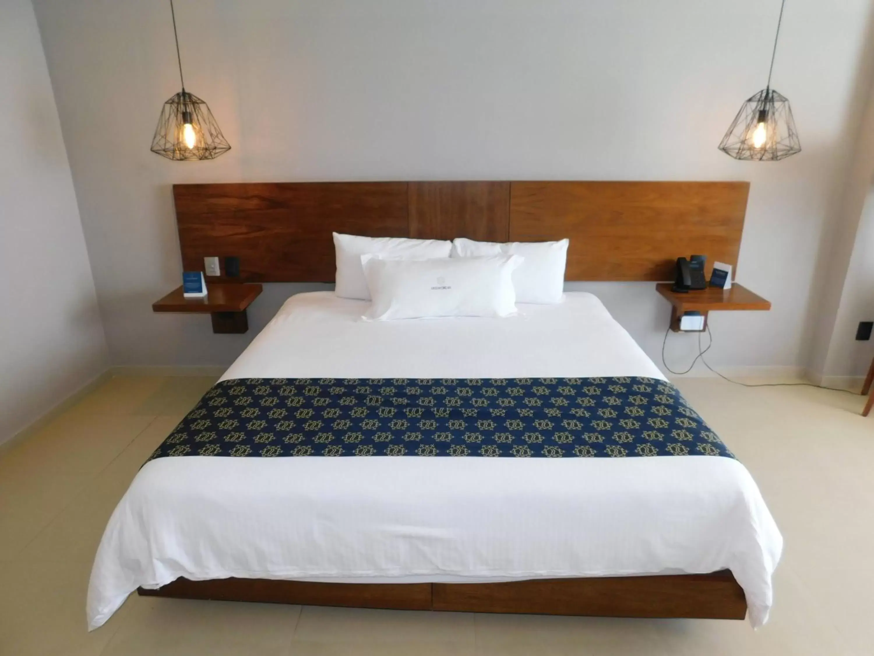 Bed in Ocean Dream Cancun by GuruHotel