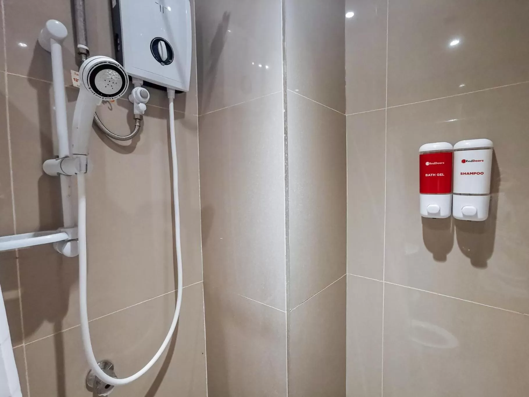 Shower in RedDoorz Plus near Bangko Sentral Ng Pilipinas Davao