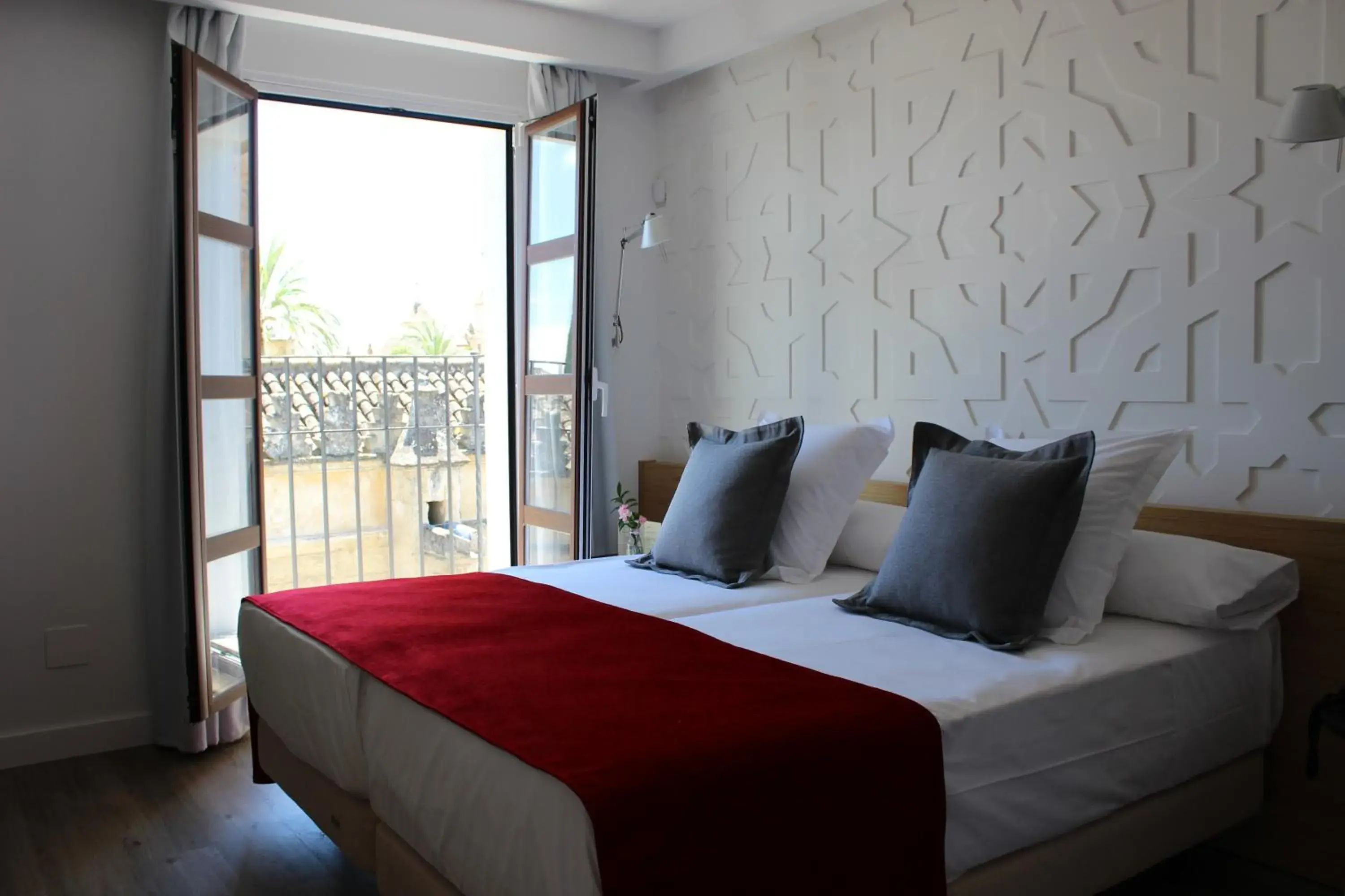 Bed in Hotel Boutique Caireles
