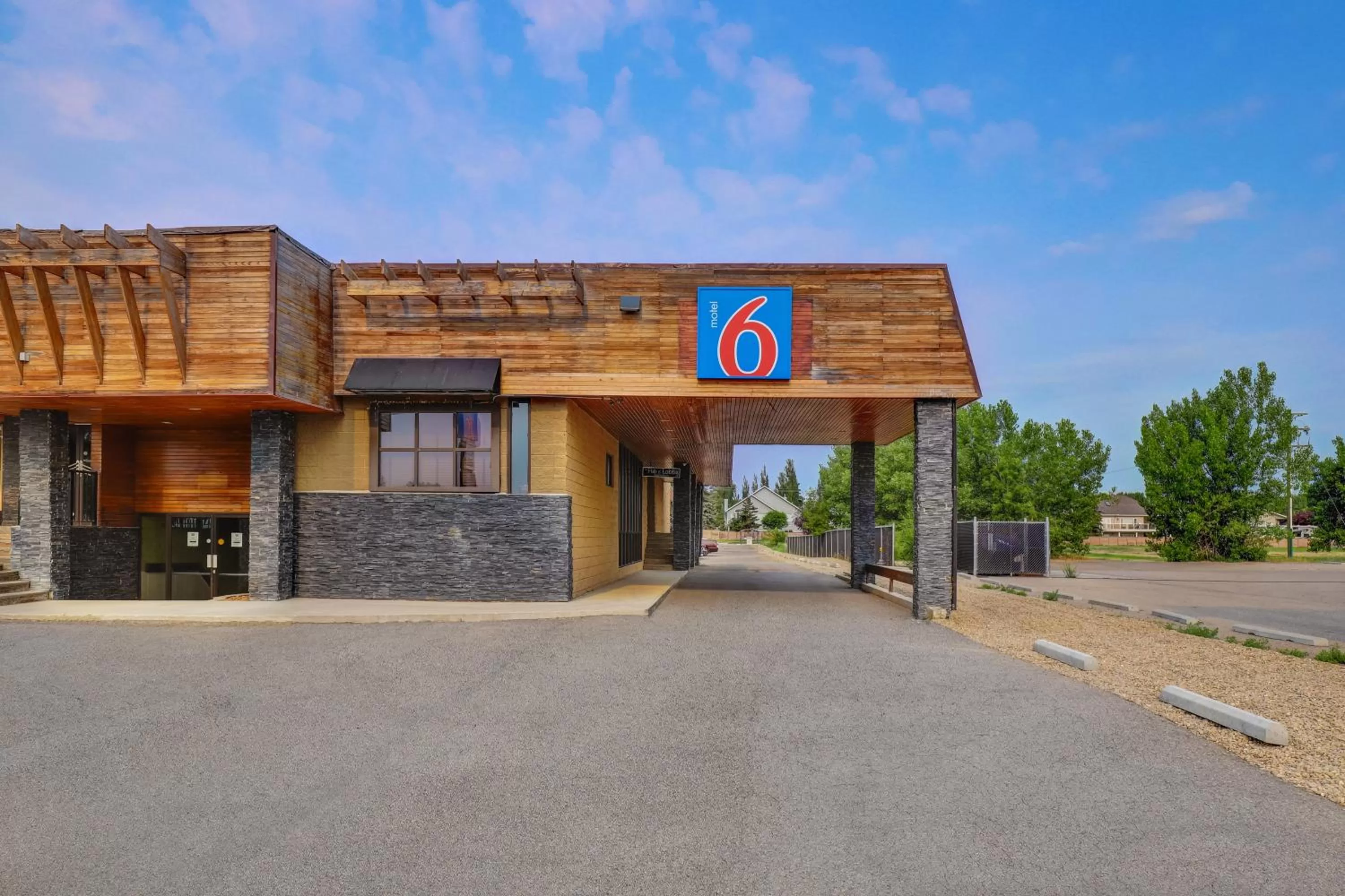 Property building in Motel 6 Brooks AB