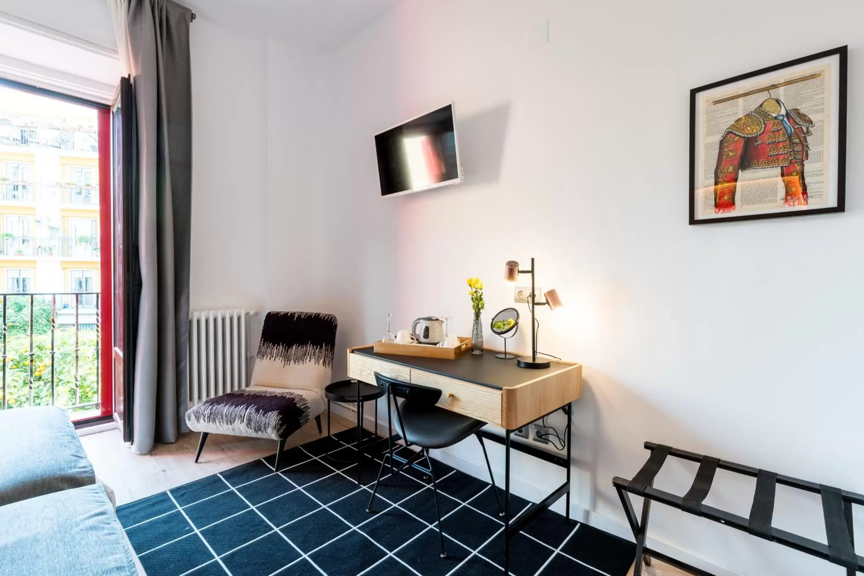 Seating area, TV/Entertainment Center in Hotel Sevilla