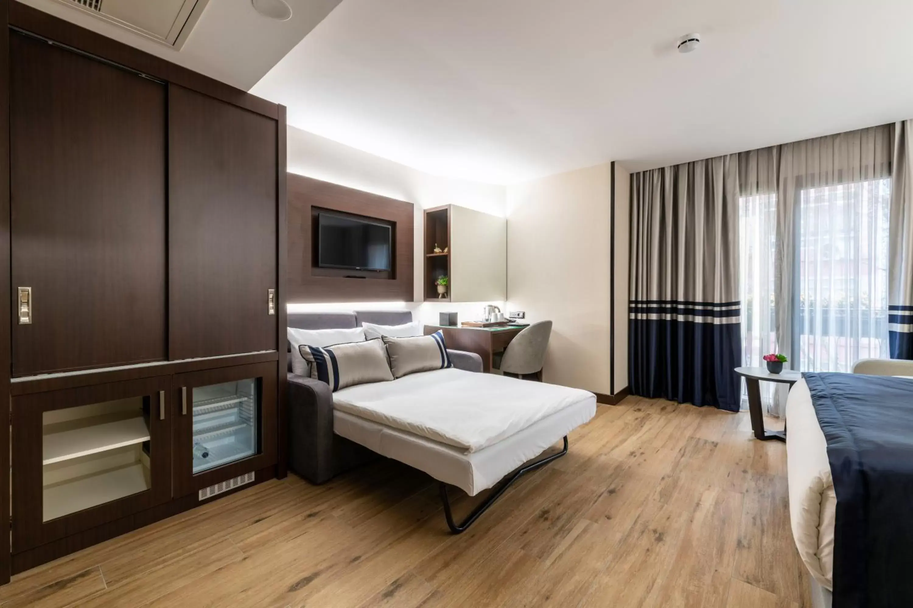 Bed in Aprilis Deluxe Hotel Bed in Aprilis Deluxe Hotel