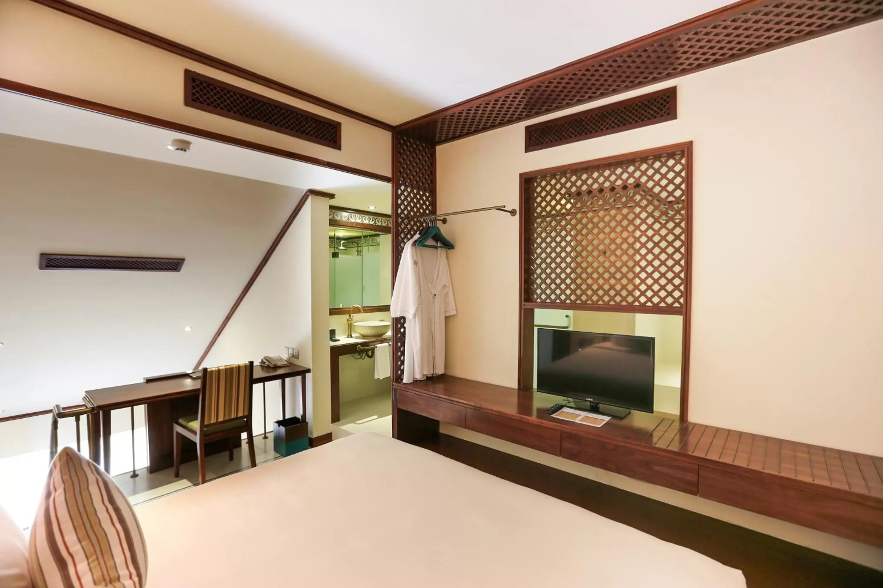 Bedroom, TV/Entertainment Center in Almanity Hoi An Resort & Spa