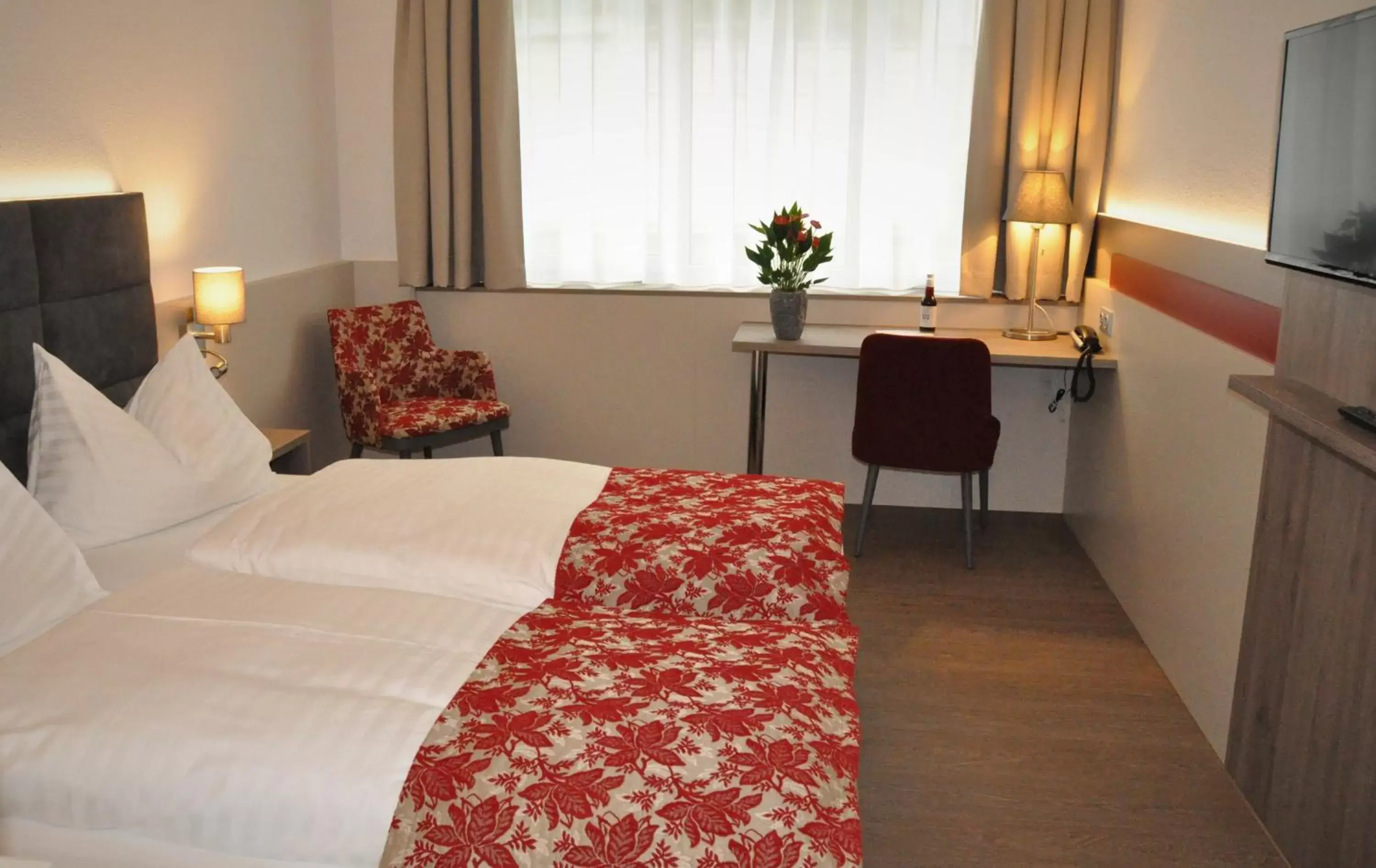 Photo of the whole room, Bed in Stadtoase Kolping Hotel