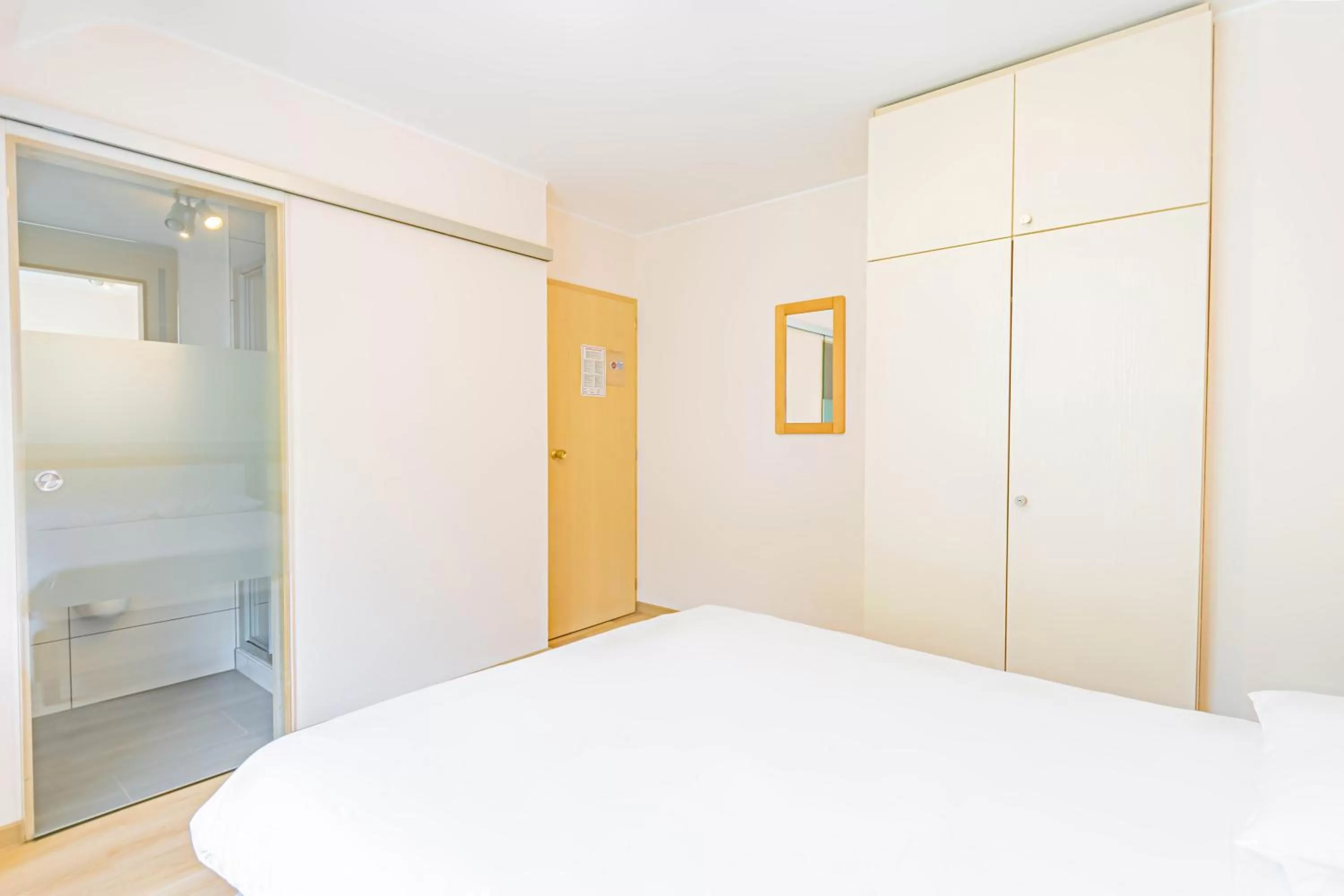 Bed in Hotel Le Postillon