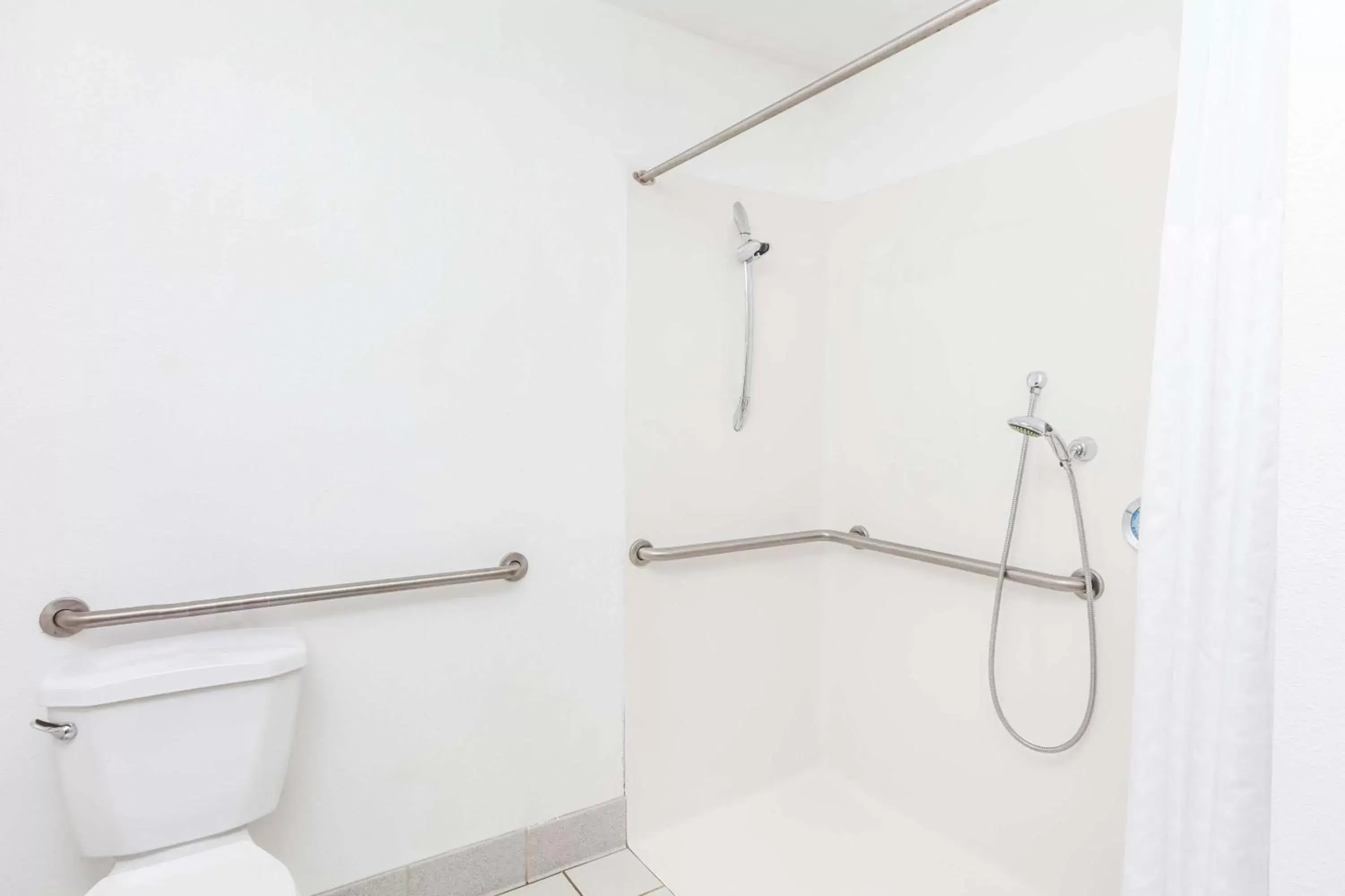 Bathroom in Days Inn & Suites by Wyndham Sunnyvale