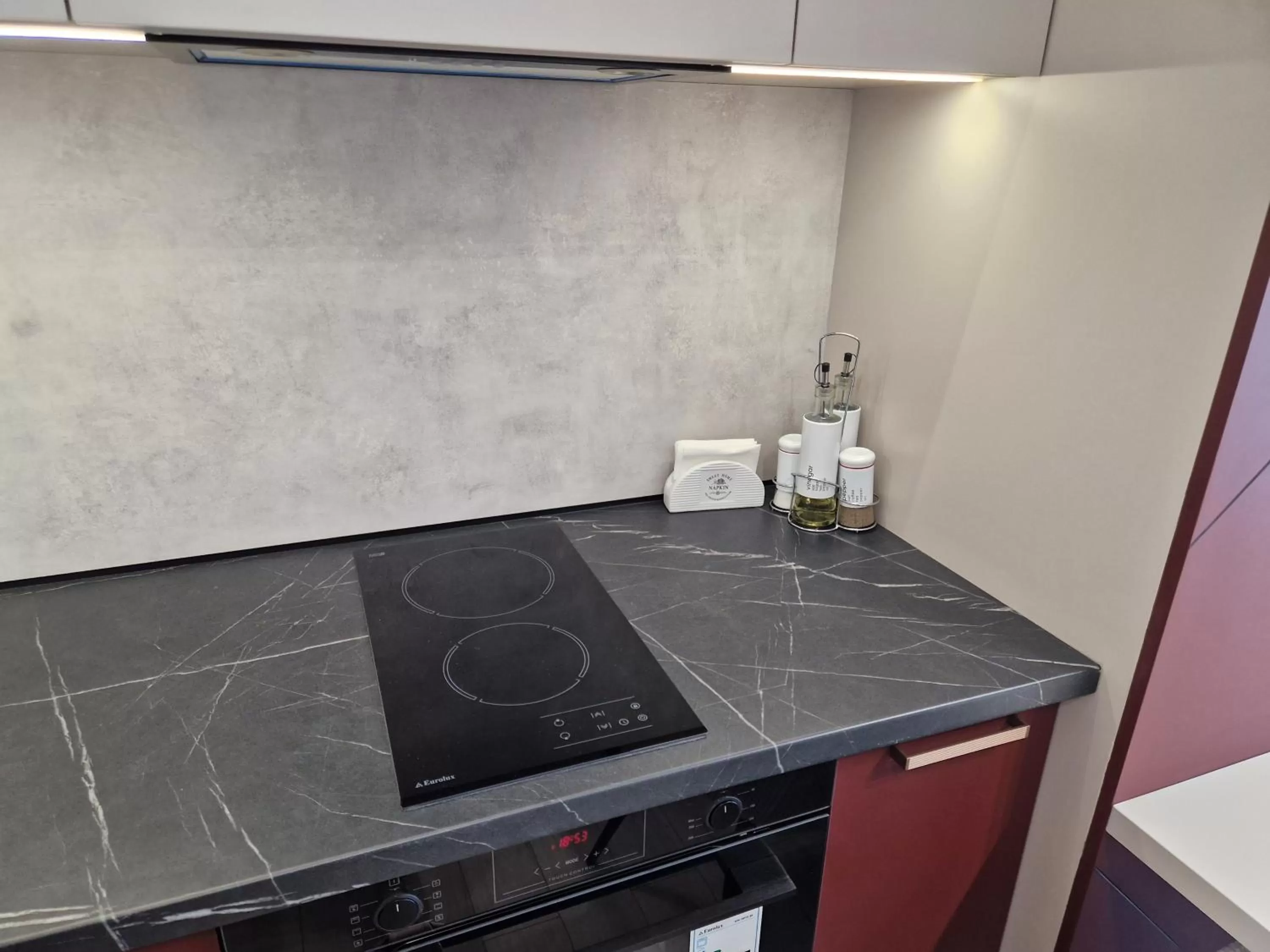 Kitchen or kitchenette in PAPAYA APARTMENTS