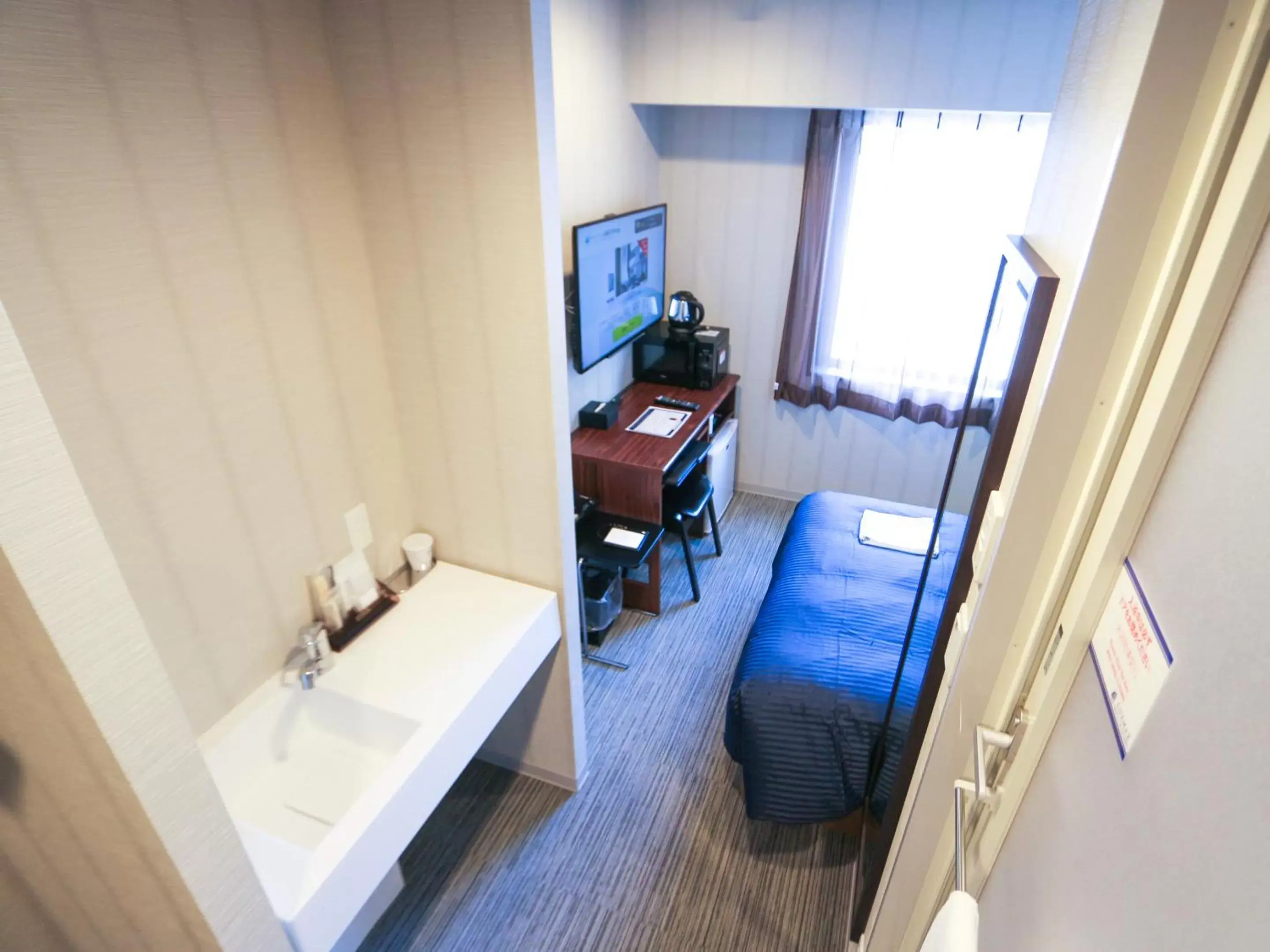 Photo of the whole room in HOTEL LiVEMAX Sapporo Susukino