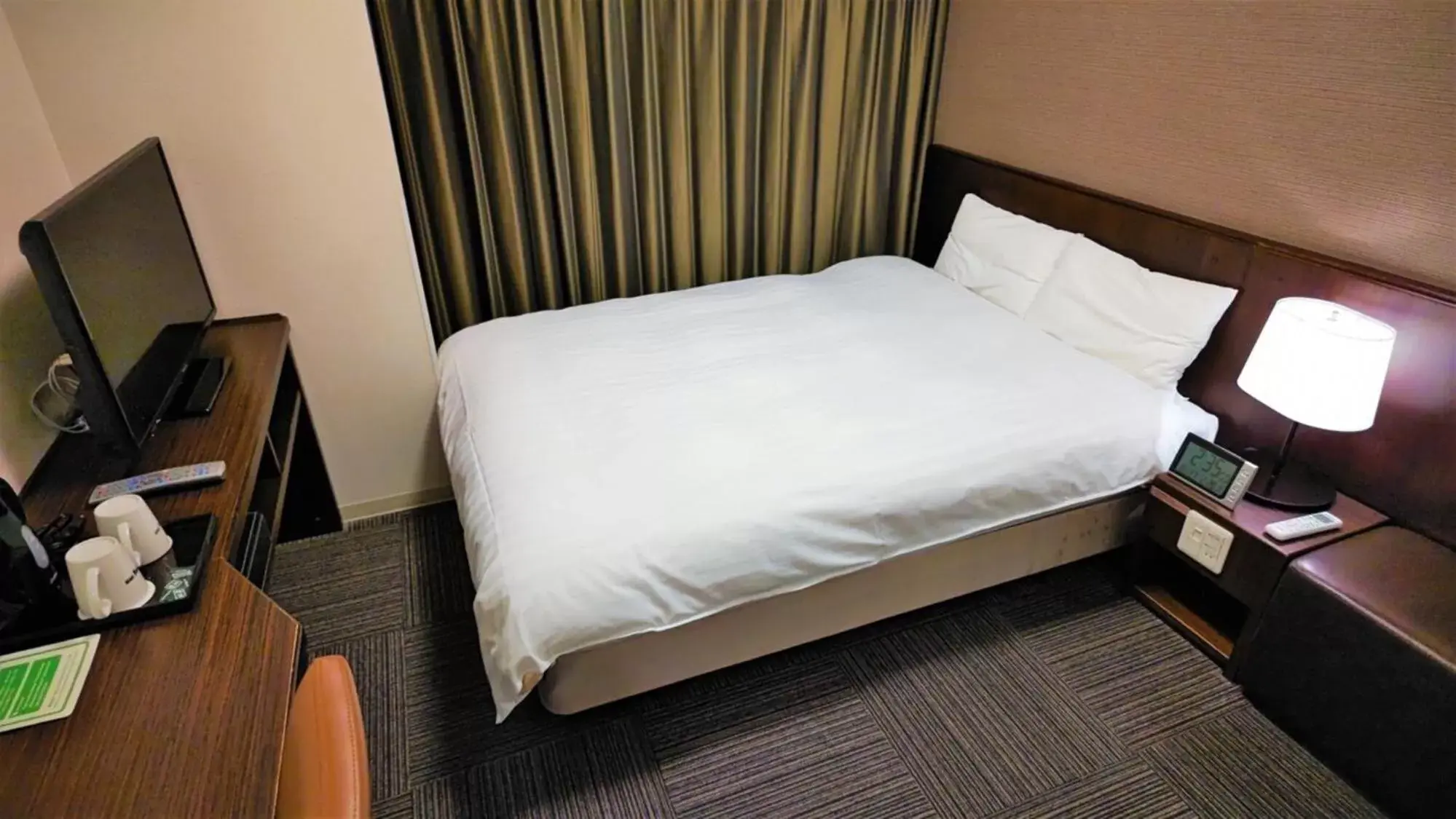 Bed in Dormy Inn Matsumoto
