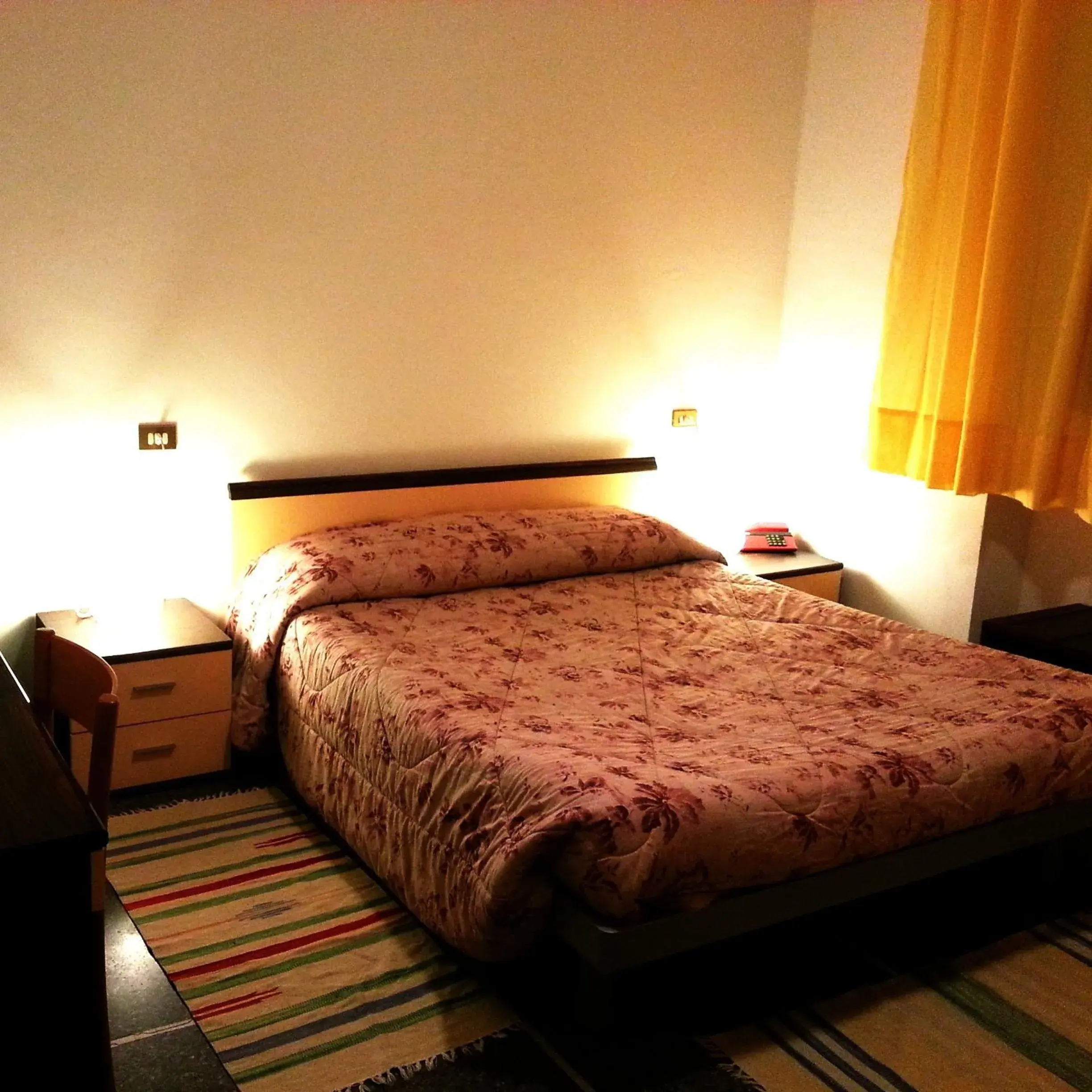 Bed in Hotel Mignon Posta