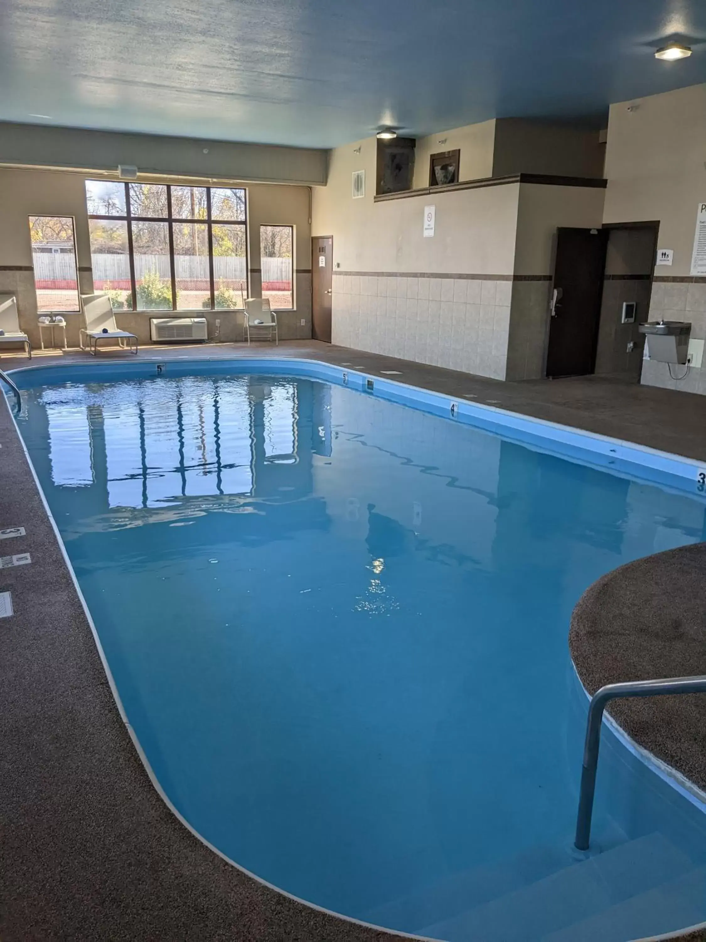 Toilet, Swimming Pool in Quality Inn & Suites Delaware