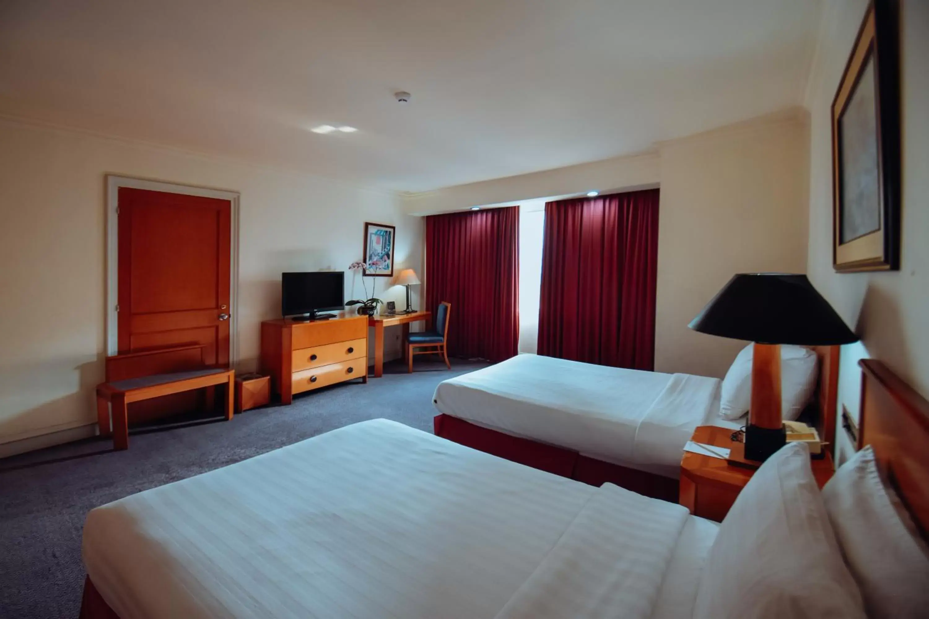 Bed in Surabaya Suites Hotel Powered by Archipelago