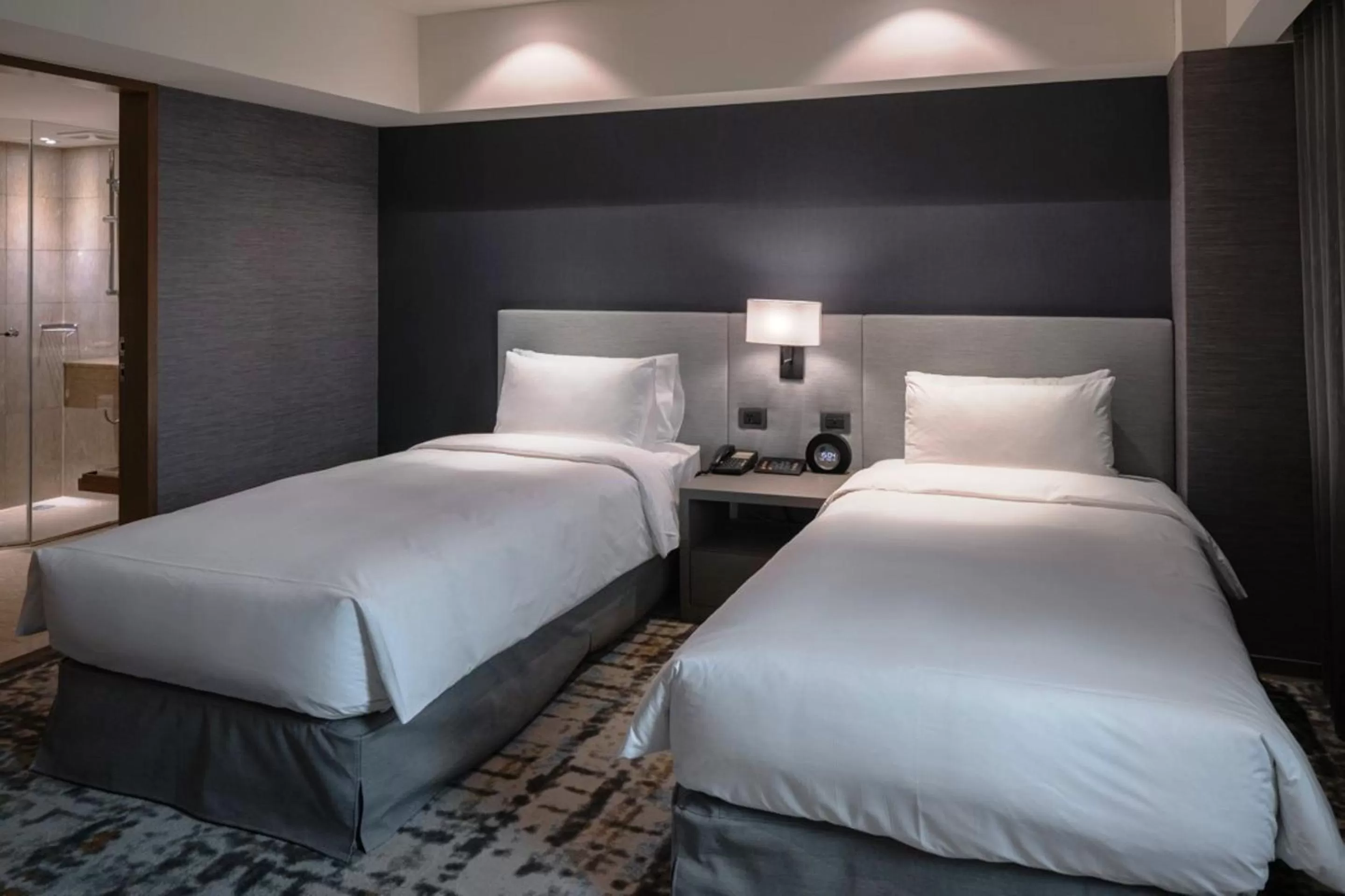 Bed in Taipei Fullerton Hotel - South