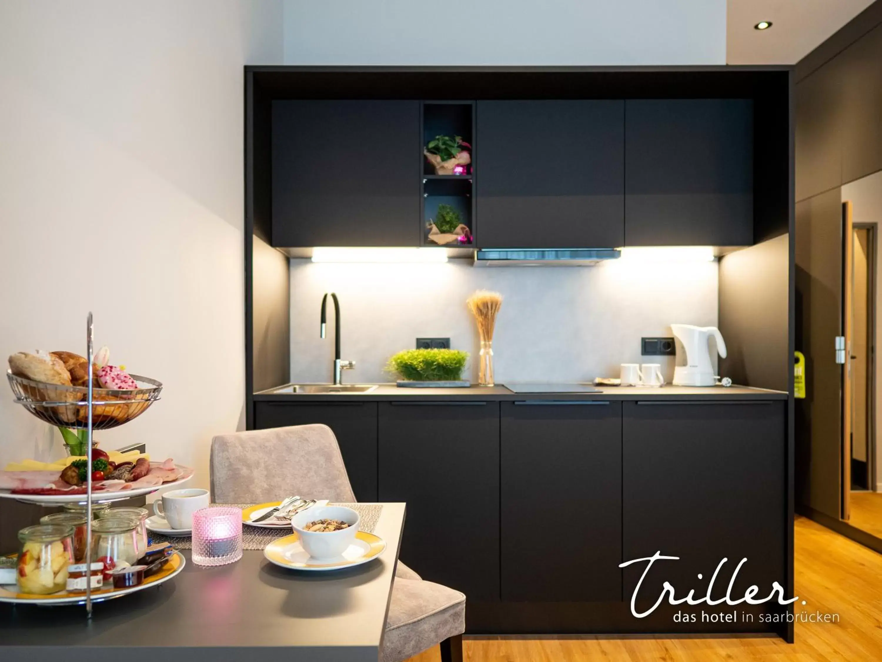 Kitchen or kitchenette in Hotel Am Triller - Hotel & Serviced Apartments