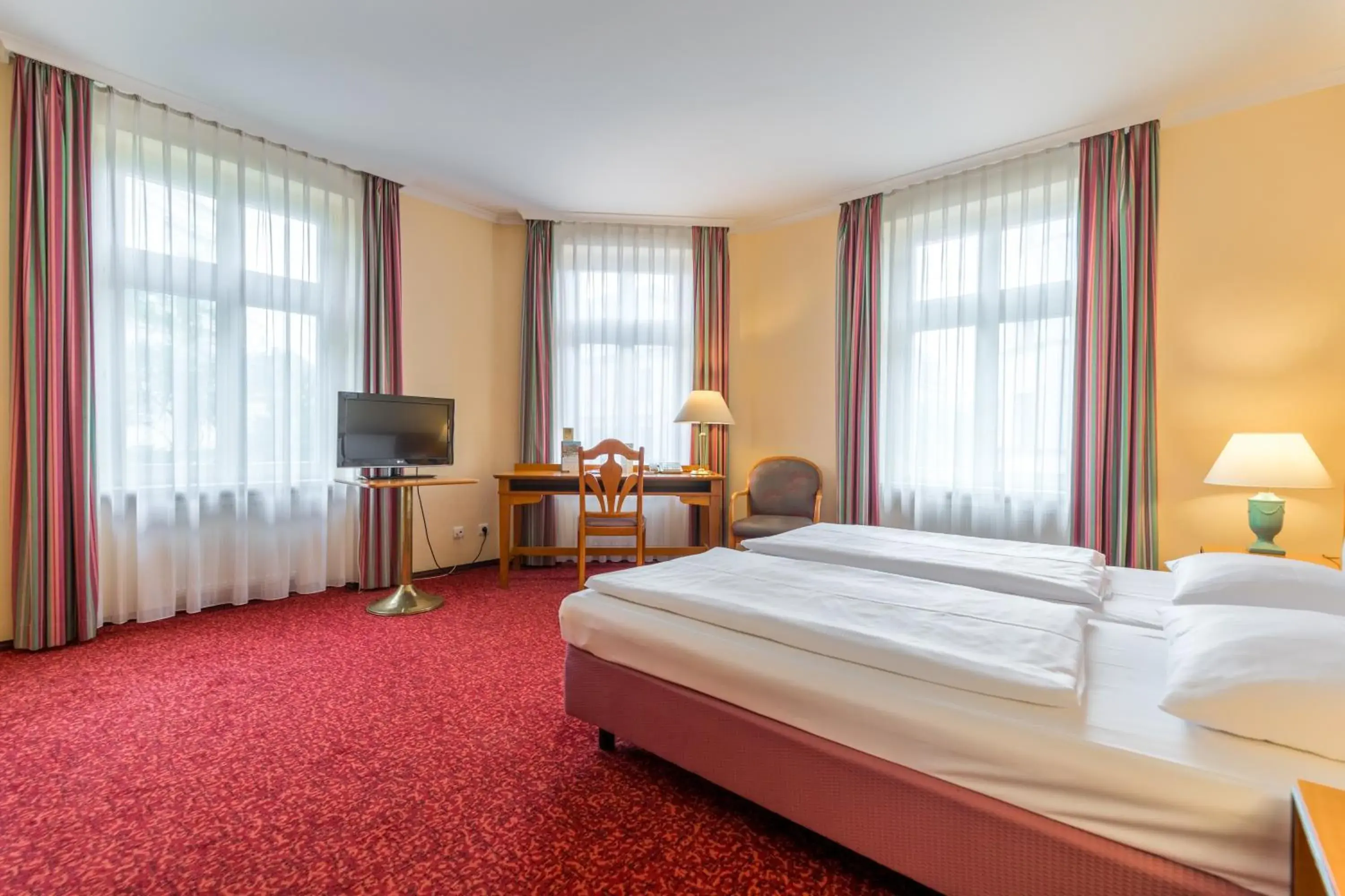 Photo of the whole room, Bed in Galerie Hotel Leipziger Hof