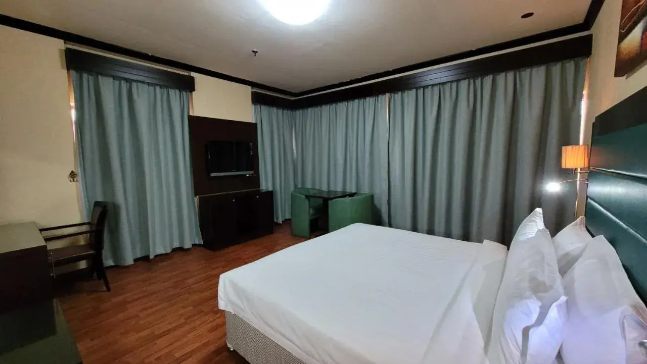 Bed in Strand Hotel