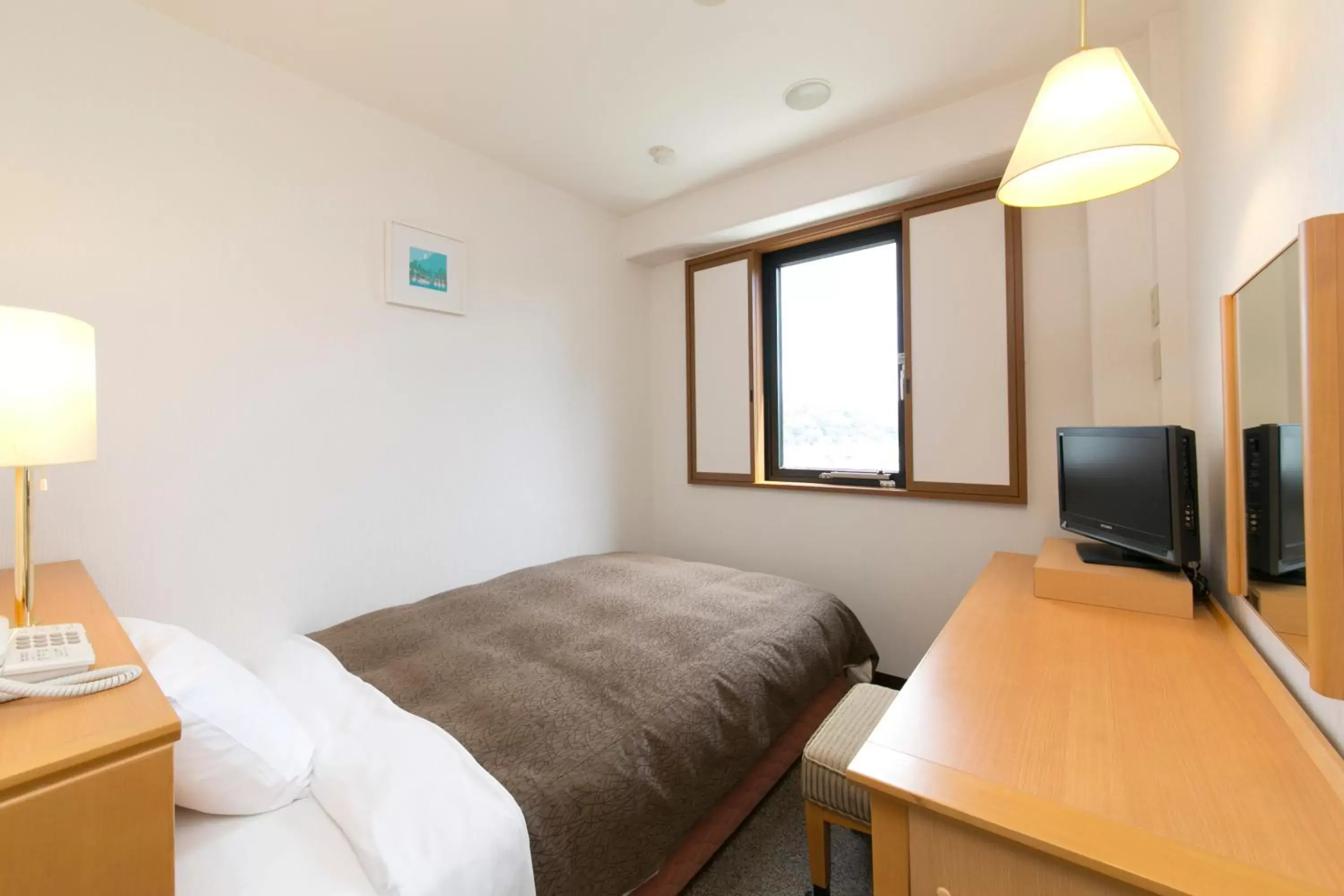 Bed in Smile Hotel Shizuoka