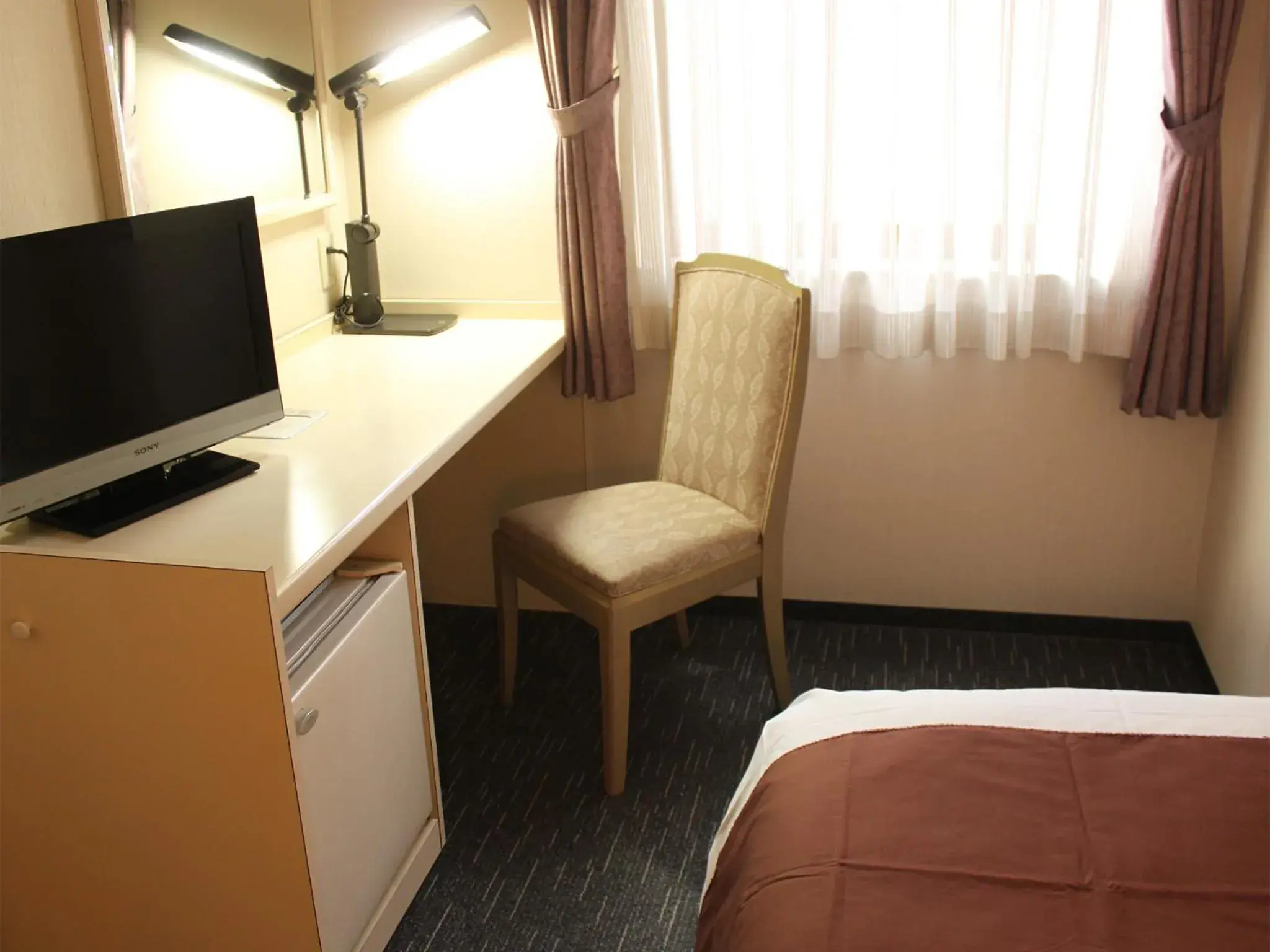 Photo of the whole room, TV/Entertainment Center in HOTEL LiVEMAX BUDGET Chofu-Ekimae