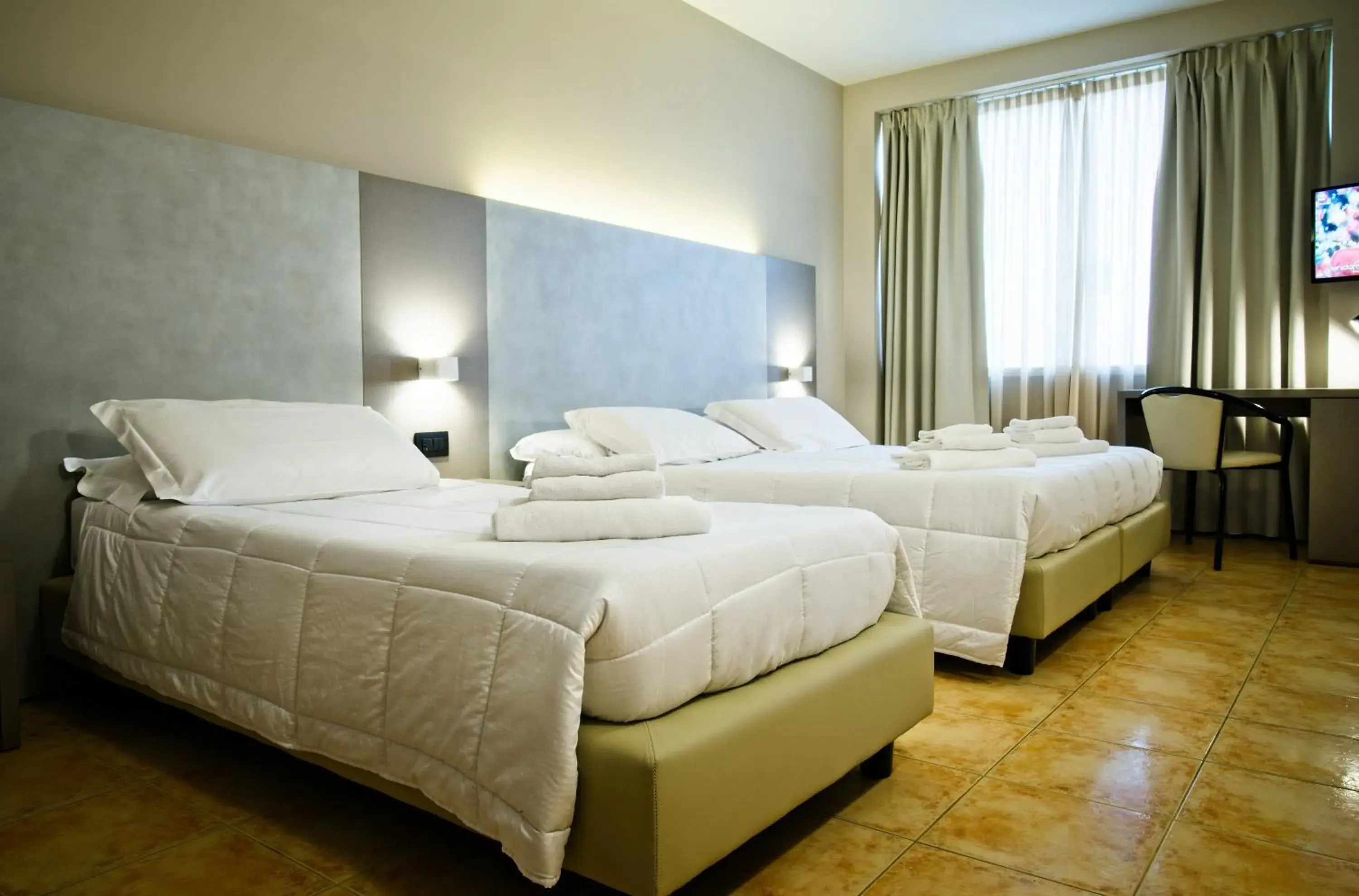 Photo of the whole room, Bed in Albergo Papillon