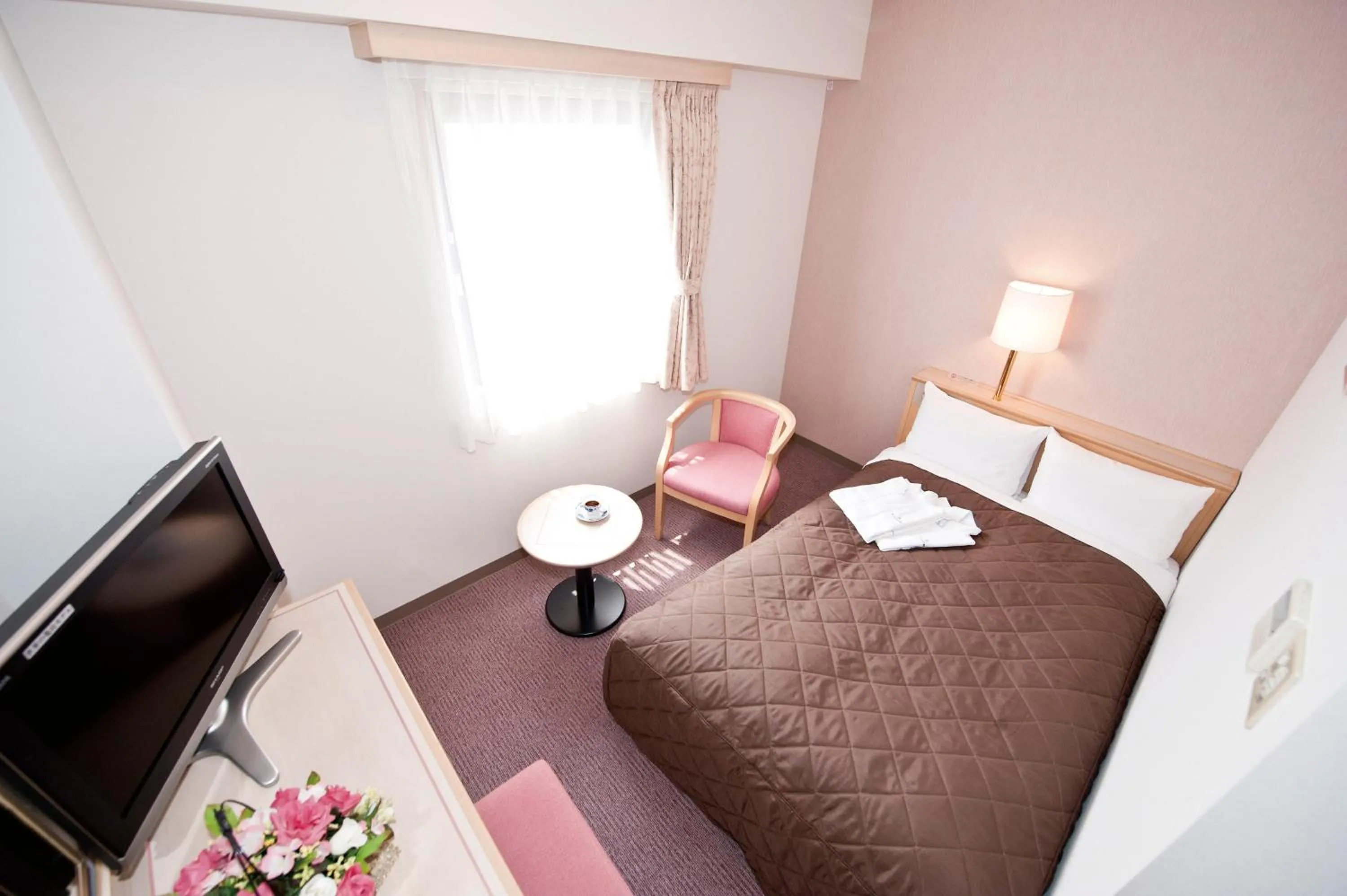 Bed in Hotel Unisite Sendai