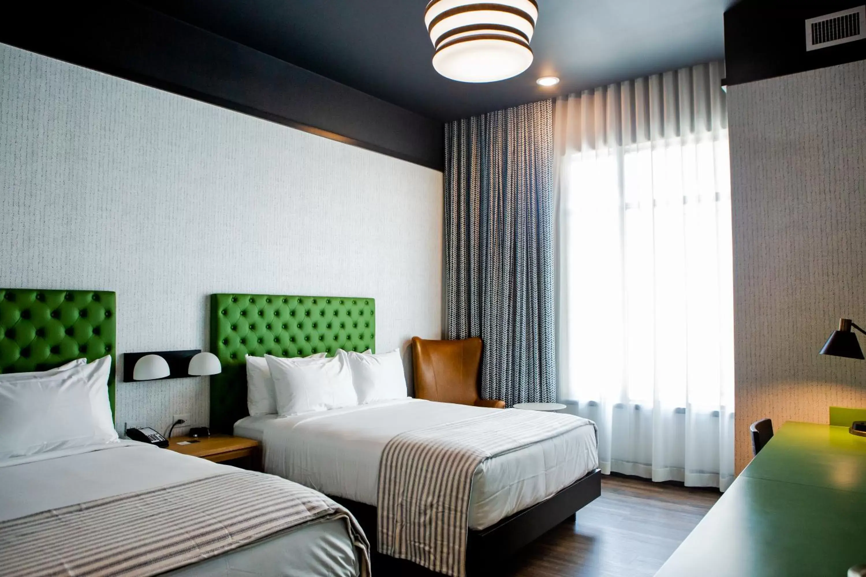 Bed in Origin Lexington, a Wyndham Hotel