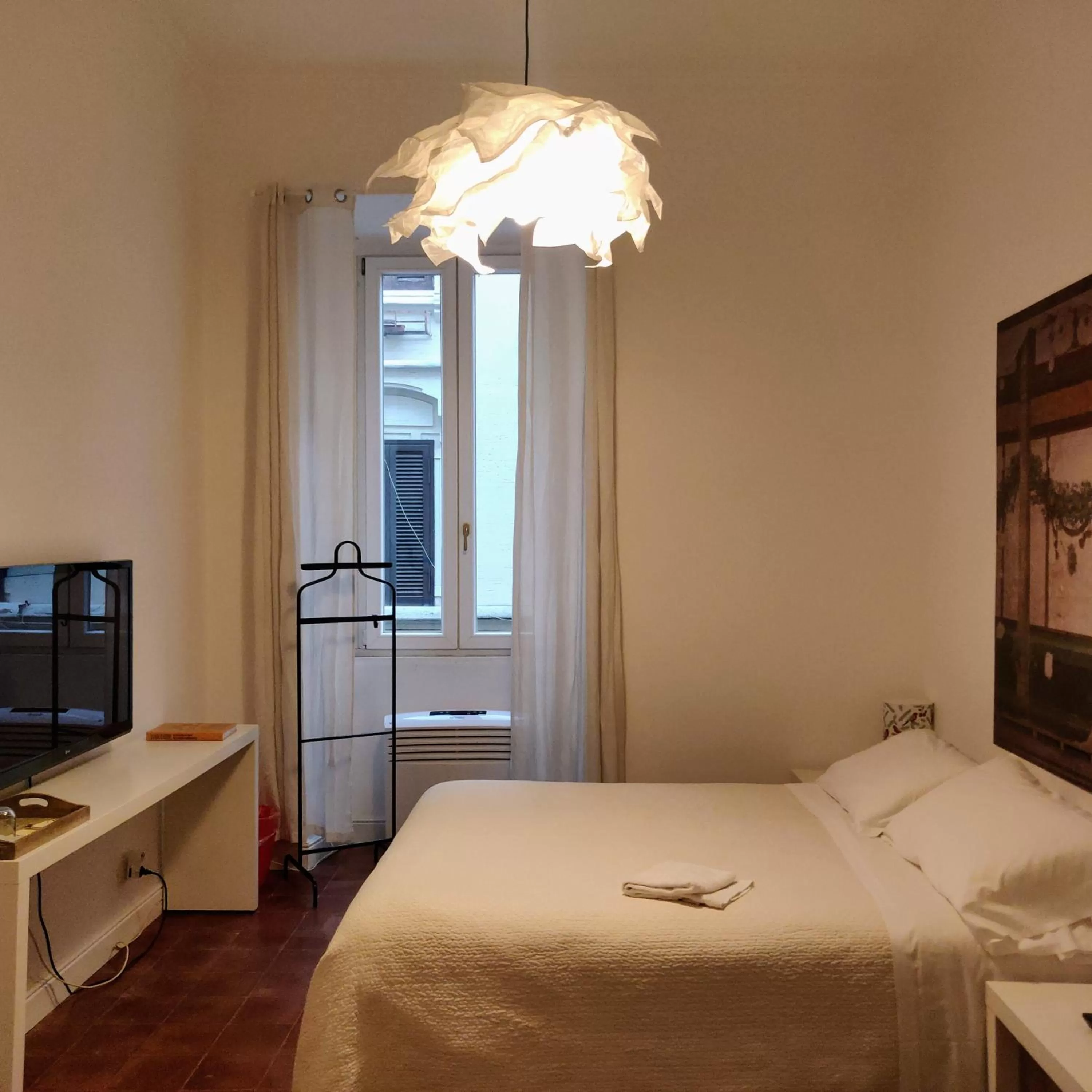 Bed in AcB Vaticano Suites