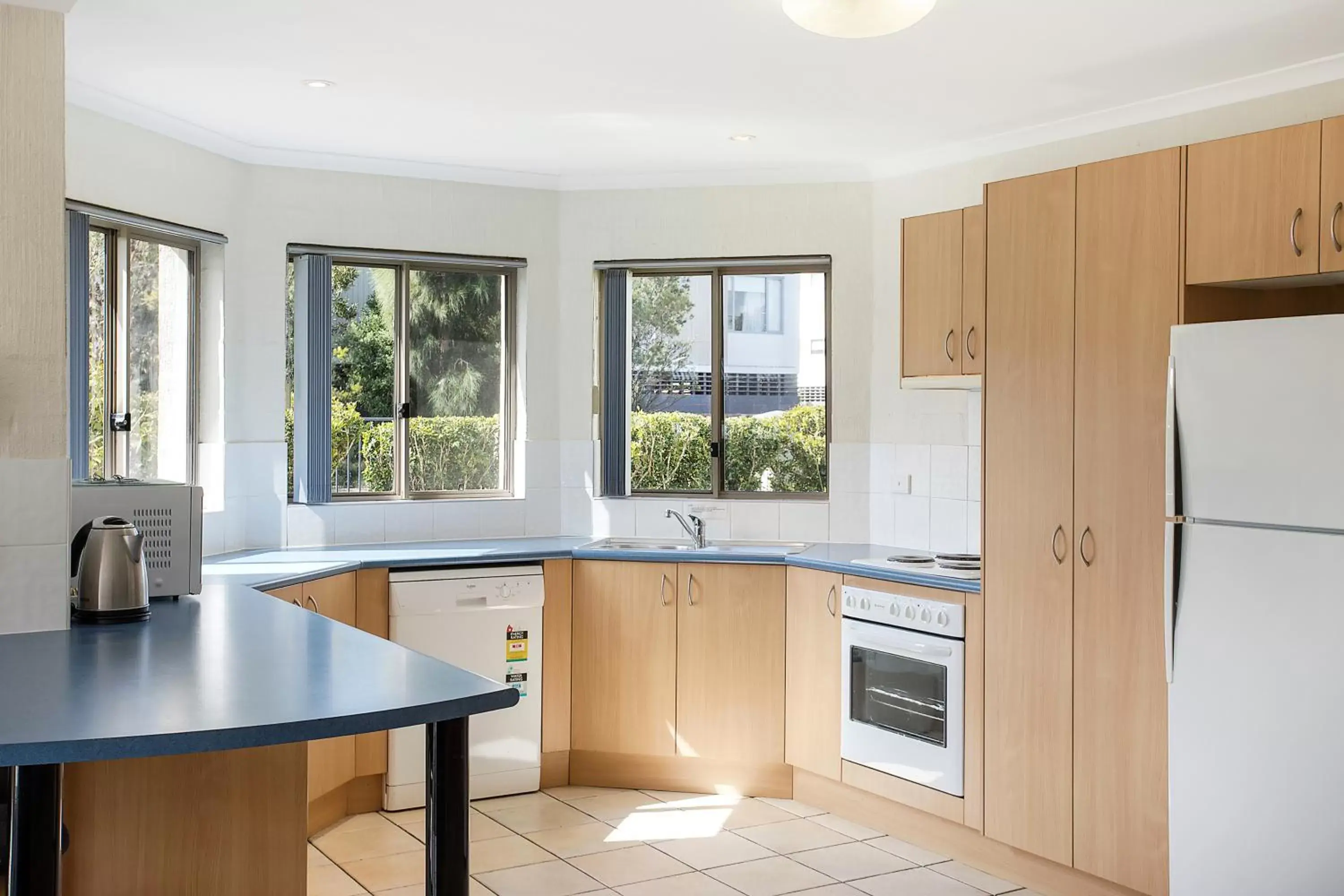Kitchen or kitchenette, Kitchen/Kitchenette in Sails Luxury Apartments Merimbula