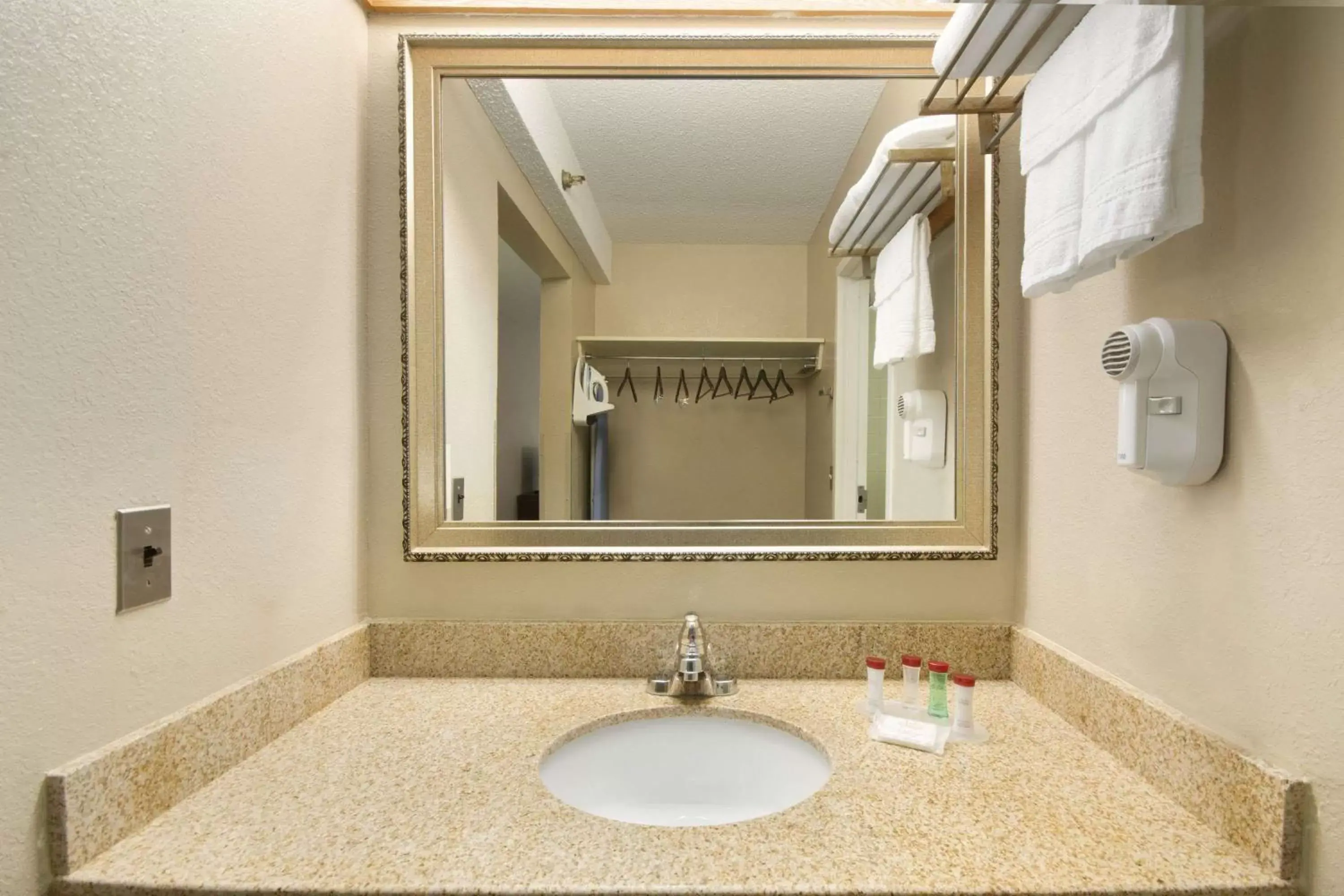 Bathroom in Ramada by Wyndham Raleigh