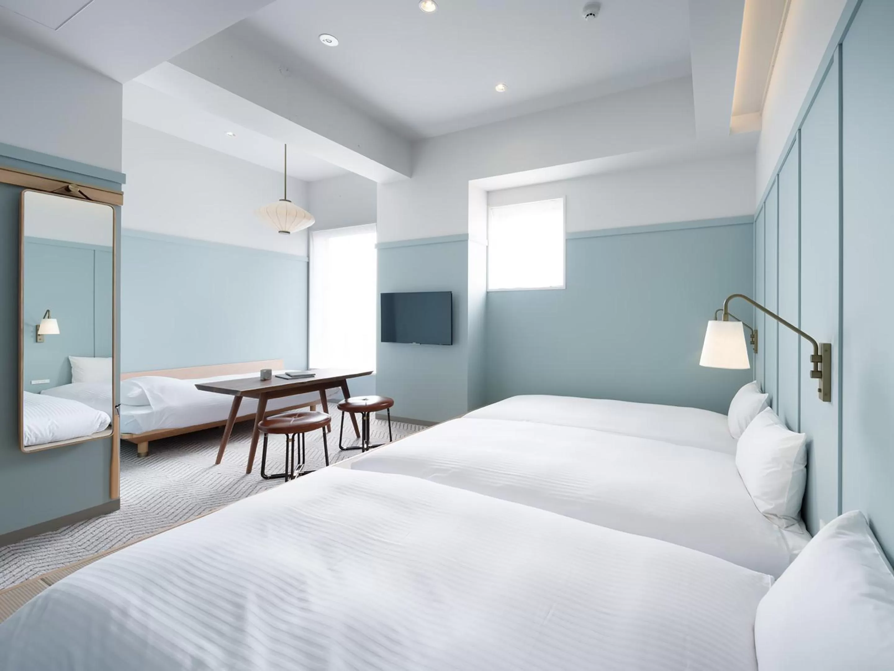 Photo of the whole room, Bed in RAKURO Kyoto by THE SHARE HOTELS