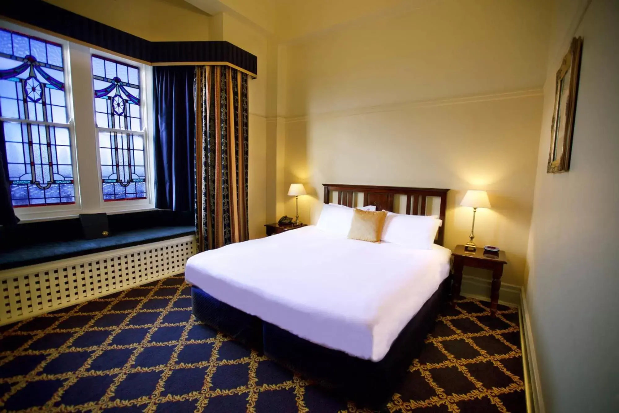 Bedroom, Bed in Carrington Hotel
