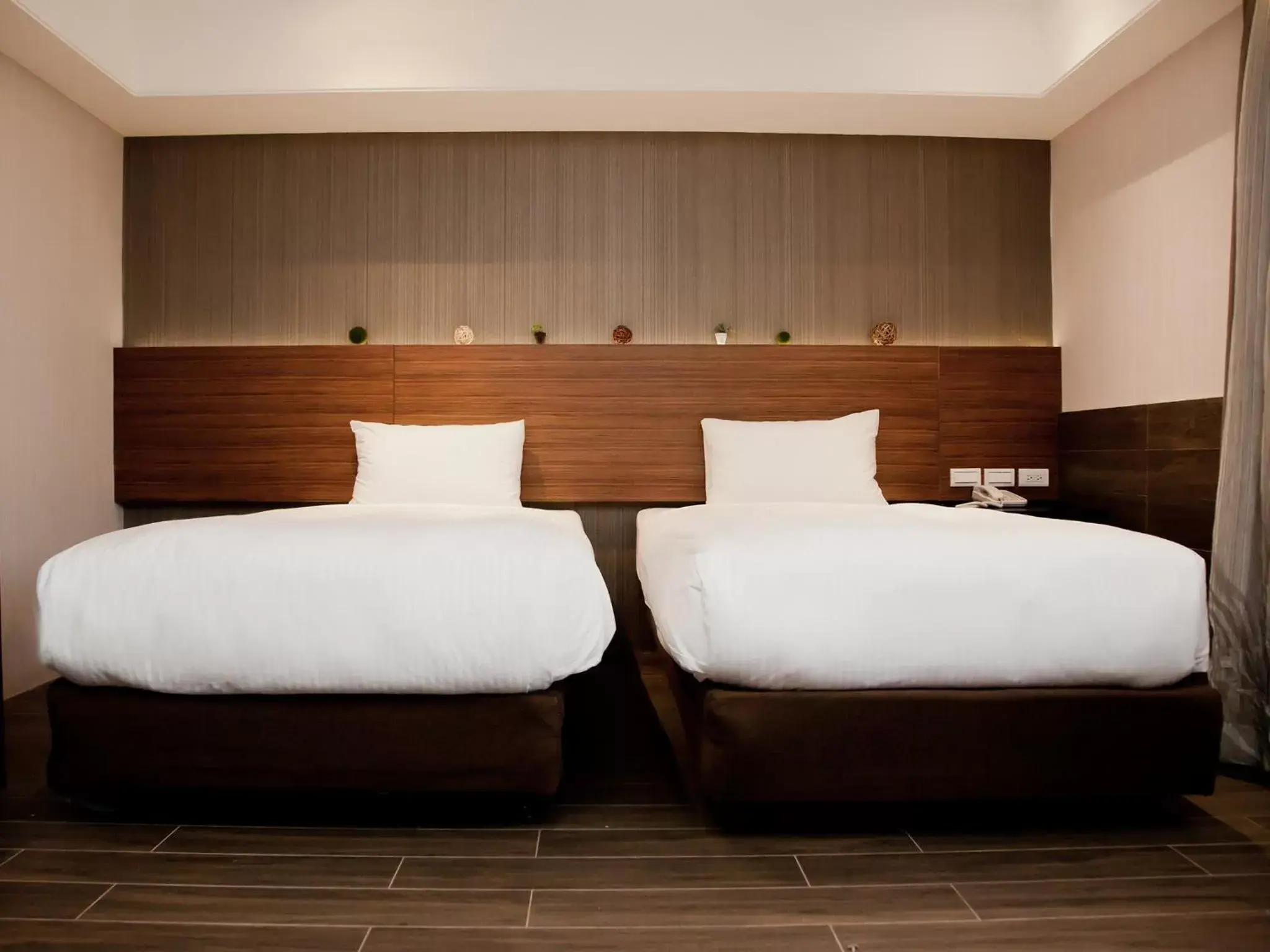 Bed in KDM Hotel