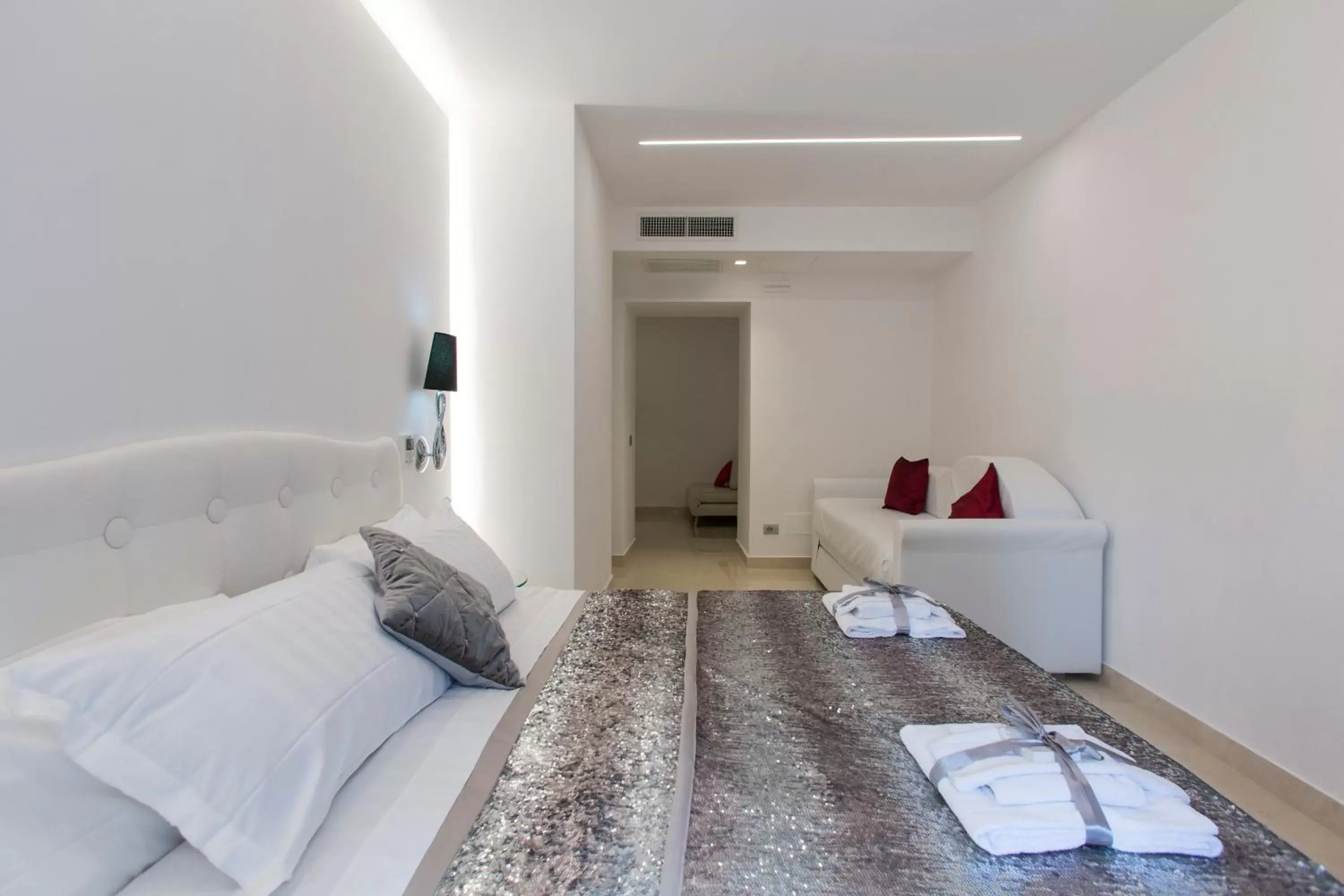 Bed in San Pietro Grand Suite