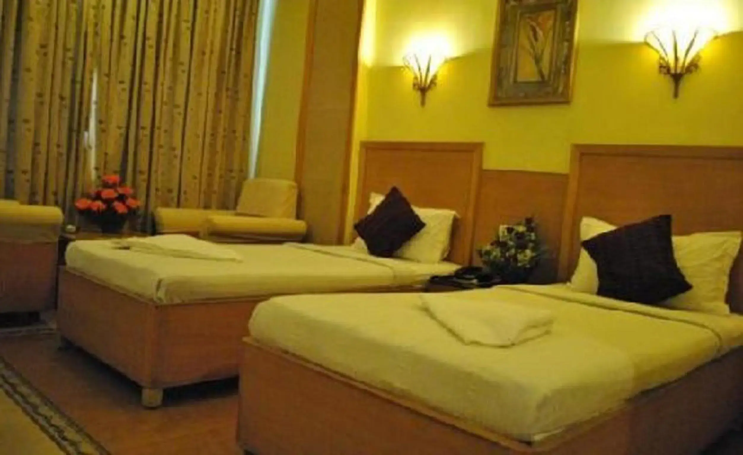 Bed in Hotel Roopa