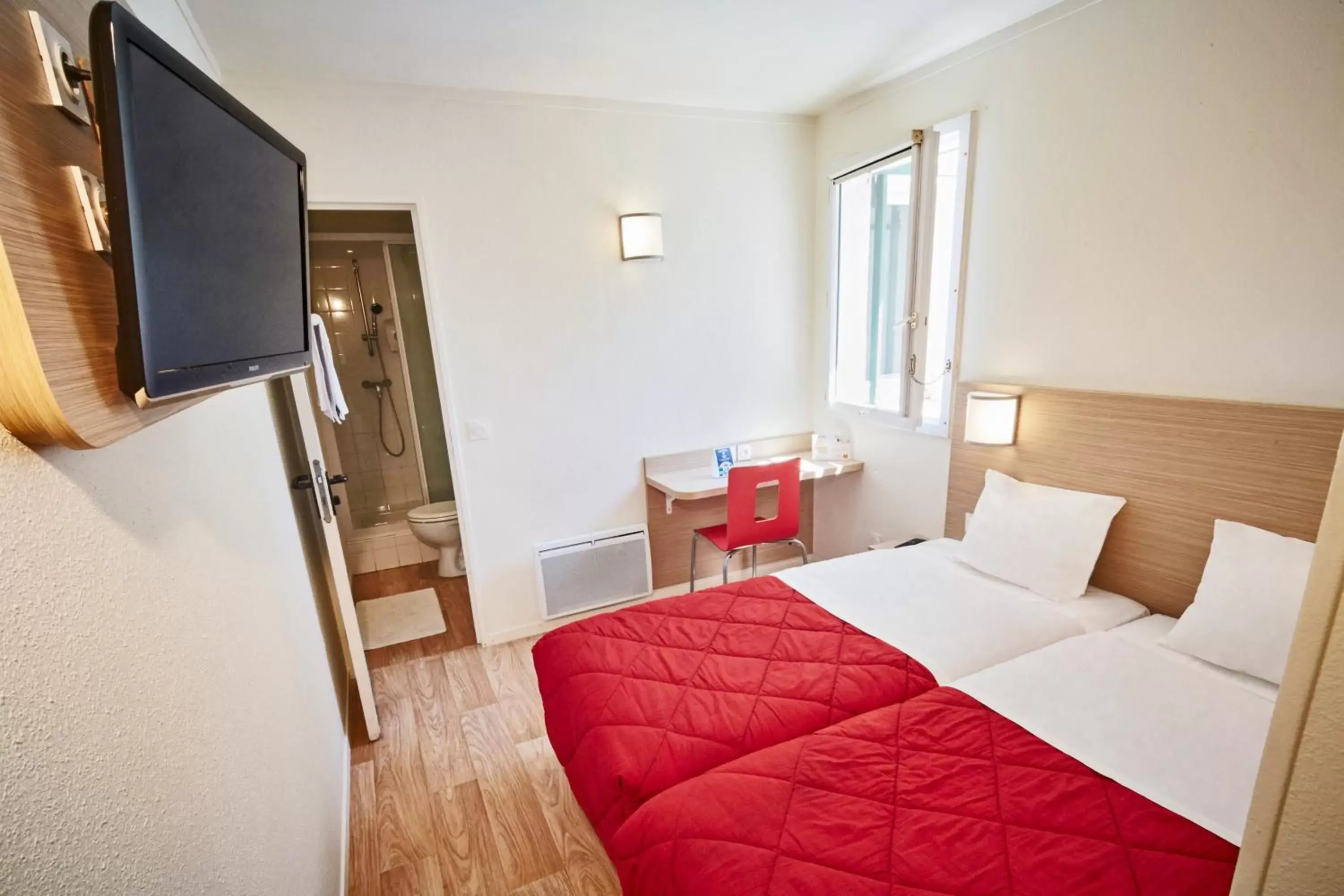 Communal lounge/ TV room, Bed in Premiere Classe Cergy Saint Christophe