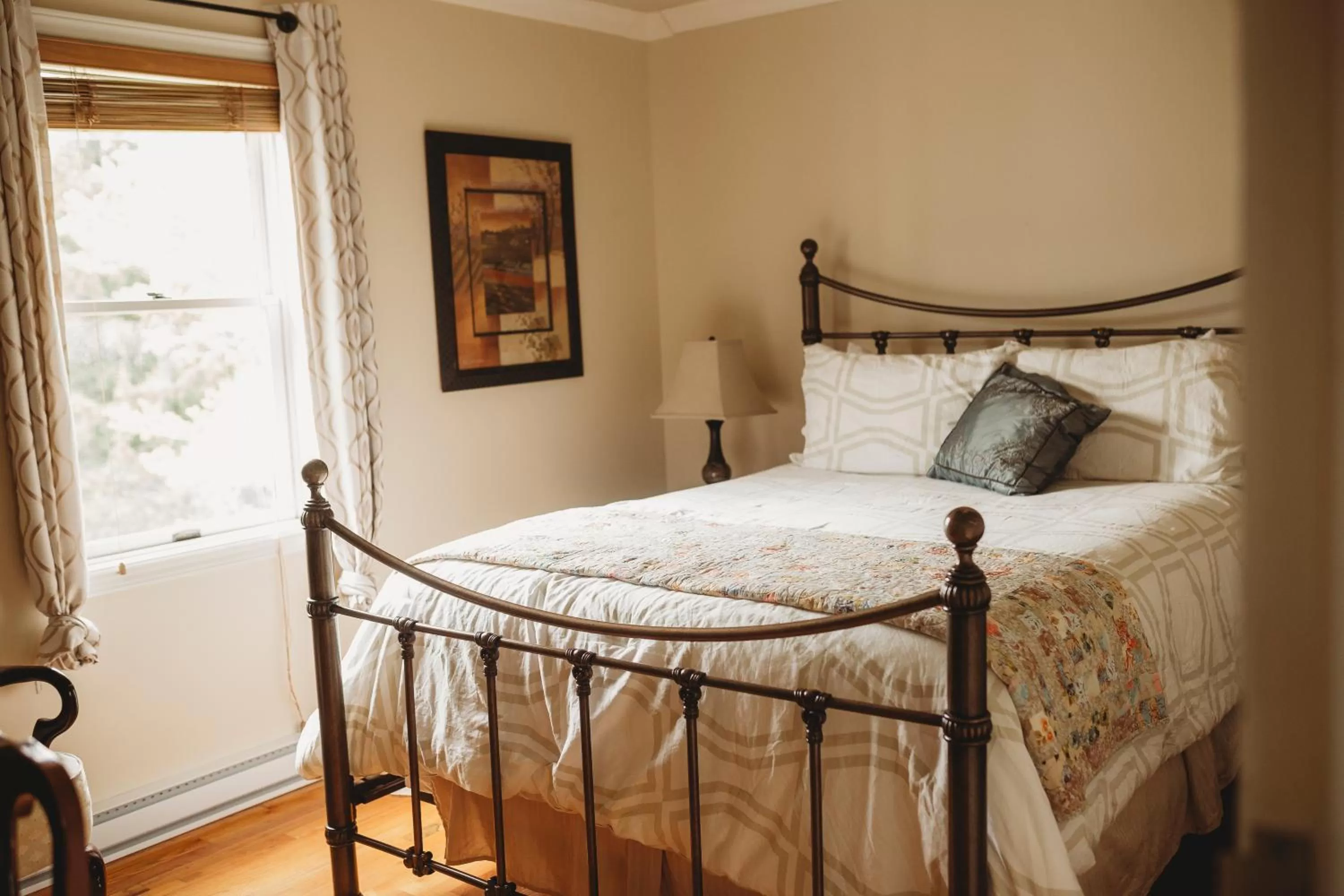 Bedroom, Bed in Carriage House Inn Four and a Half Stars