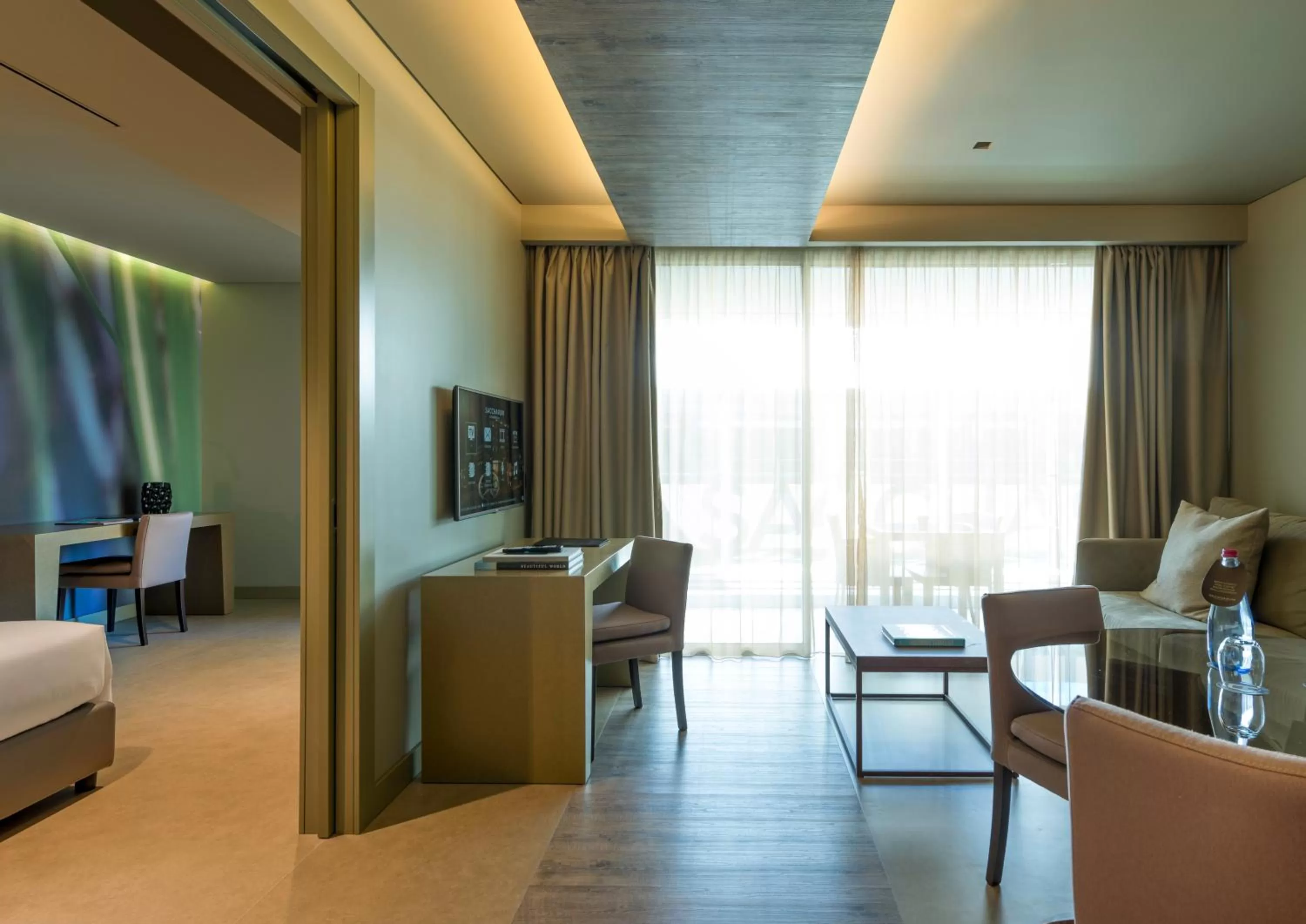 Seating area, Bed in Saccharum - Resort and Spa - Savoy Signature