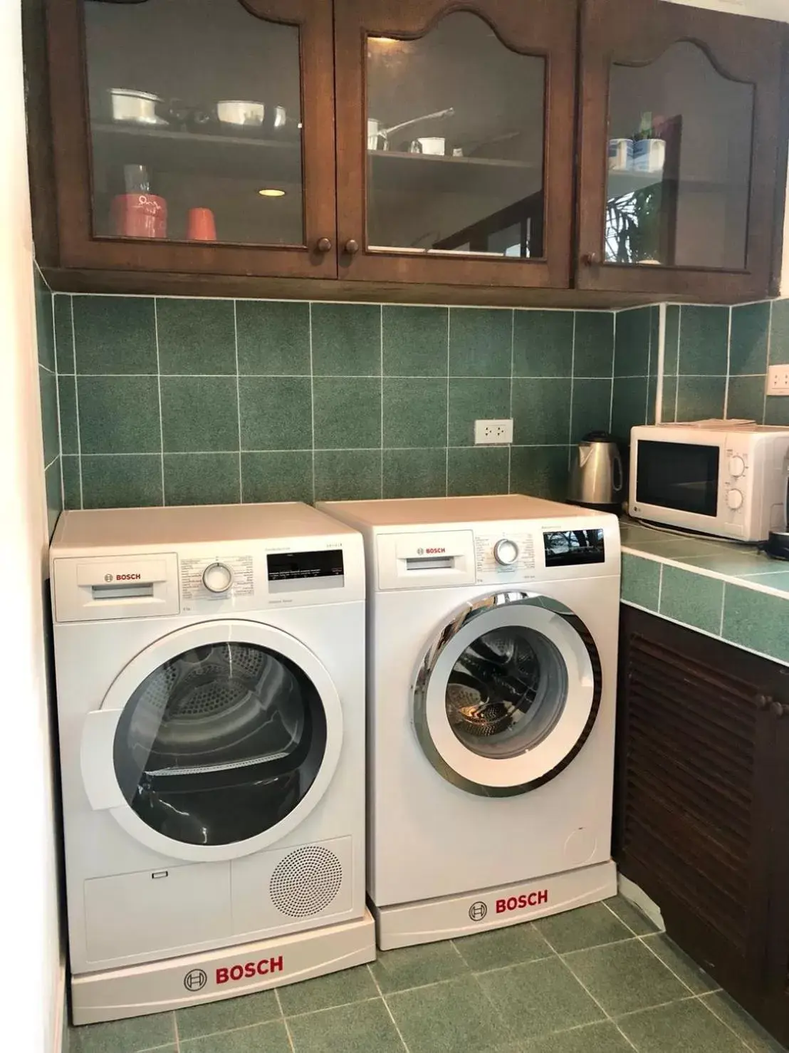 washing machine, Kitchen/Kitchenette in Dolphin Bay Beach Resort