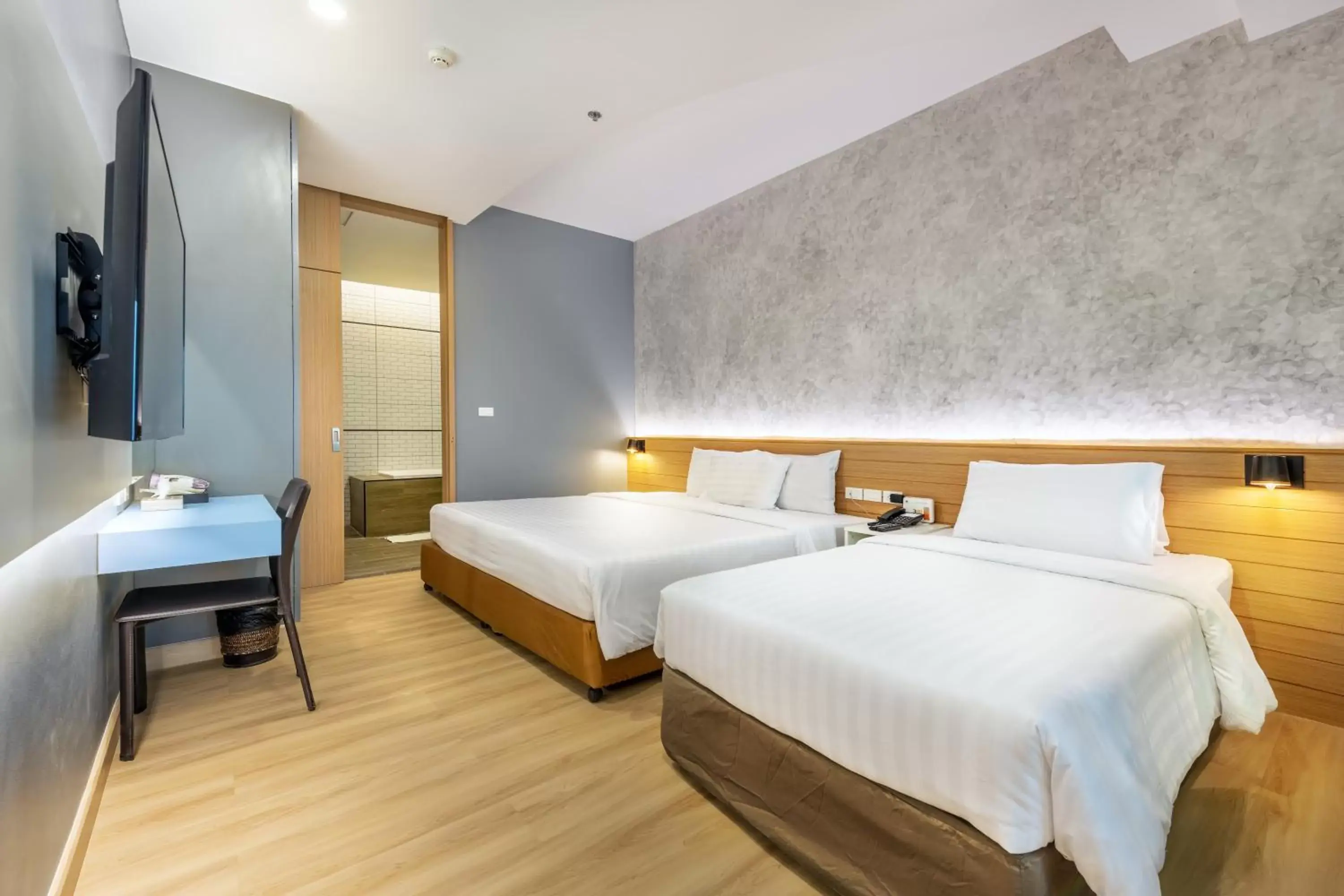 Bed in Qiu Hotel Sukhumvit SHA Plus