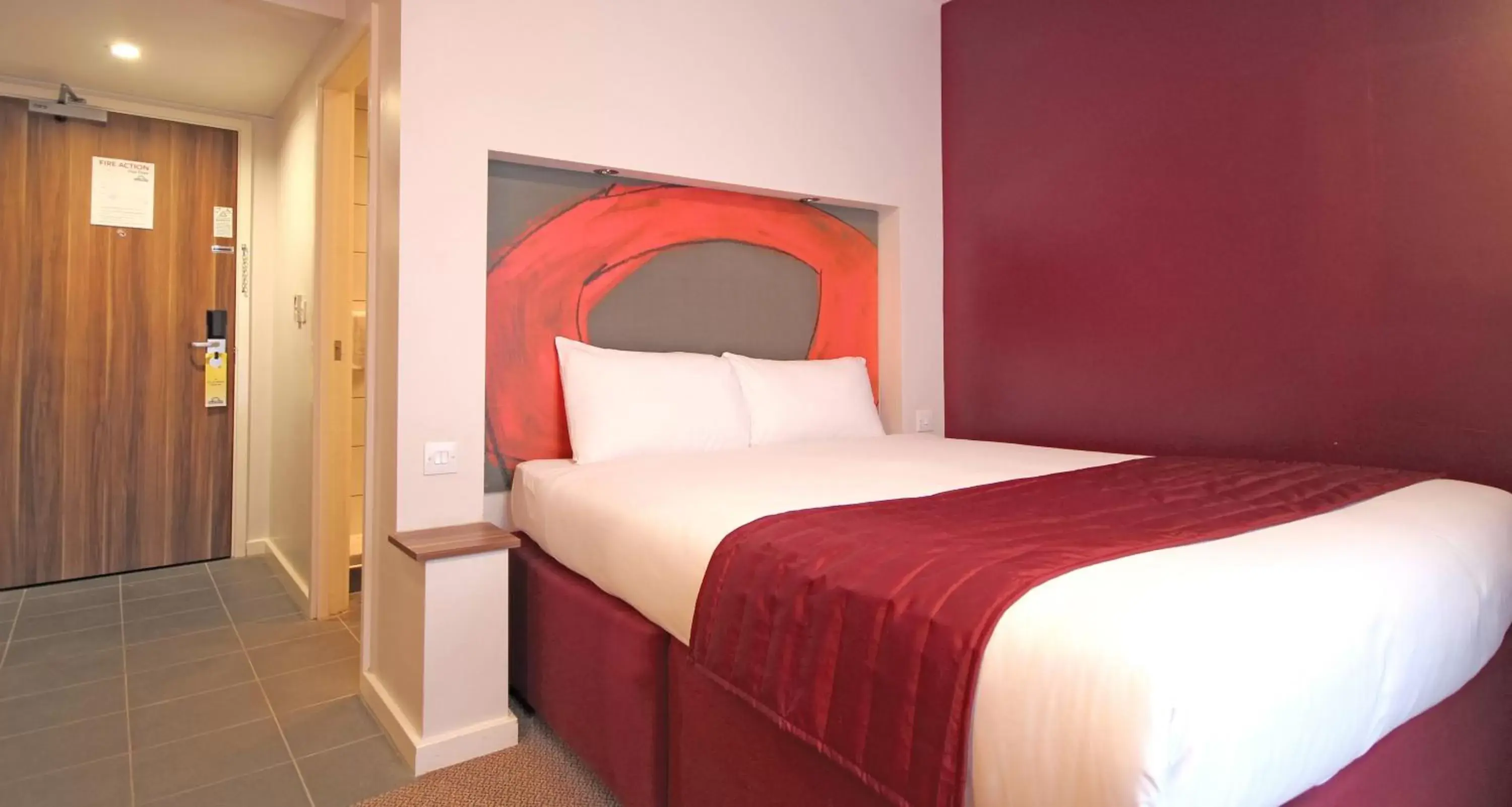 Bed in Ramada London Stansted Airport