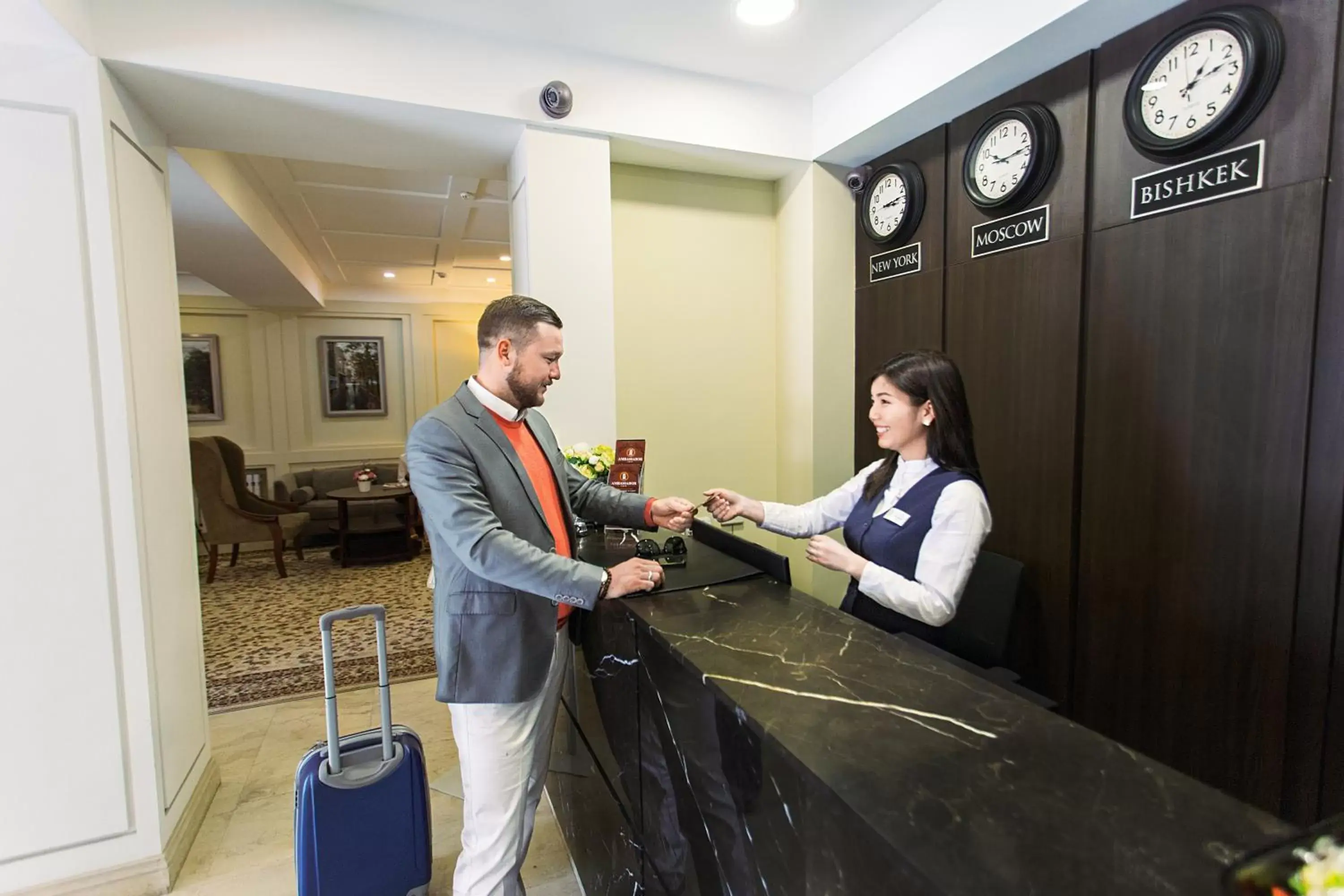 Communal lounge/ TV room, Lobby/Reception in Ambassador Hotel