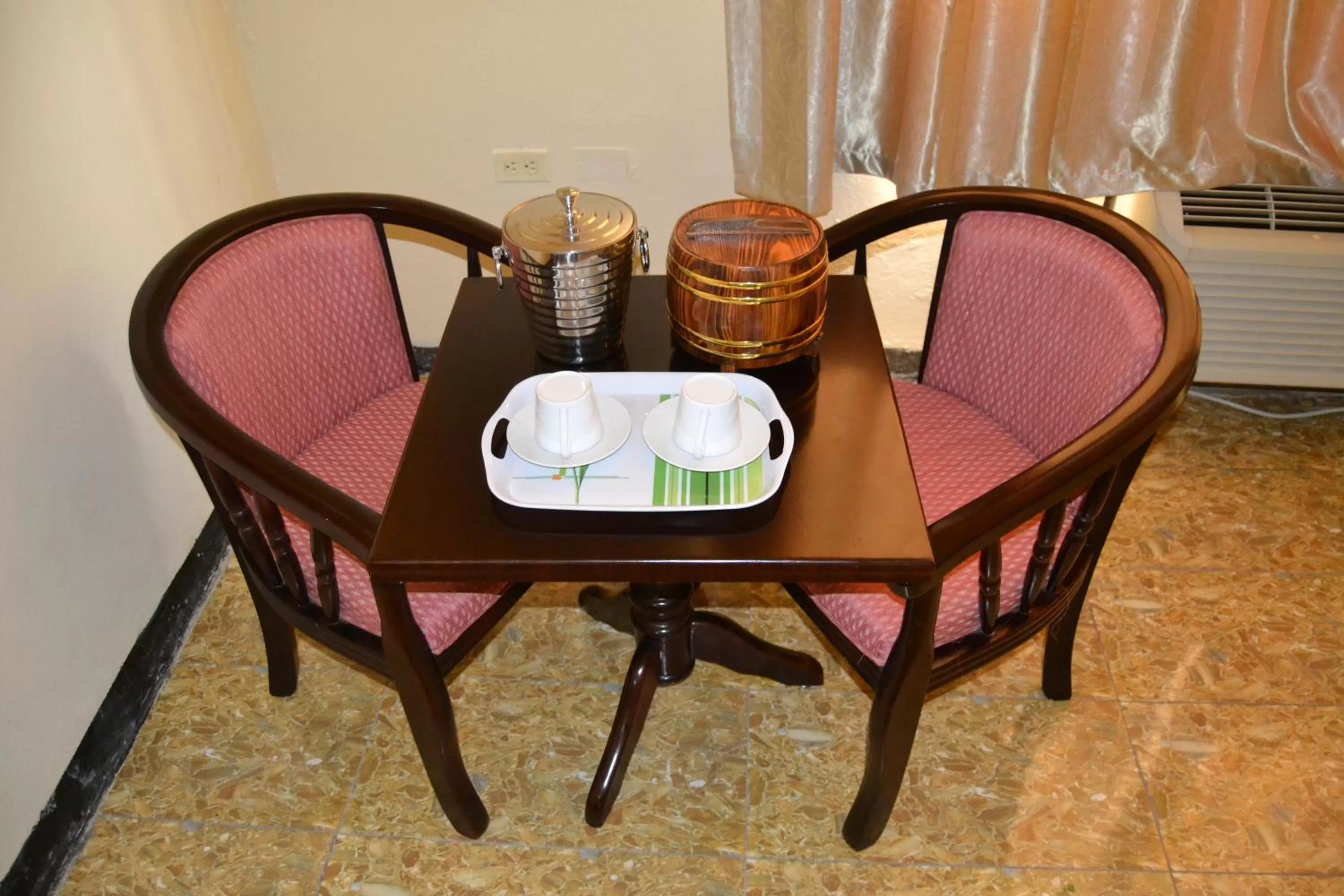 Seating area in Metro Hotel Couva