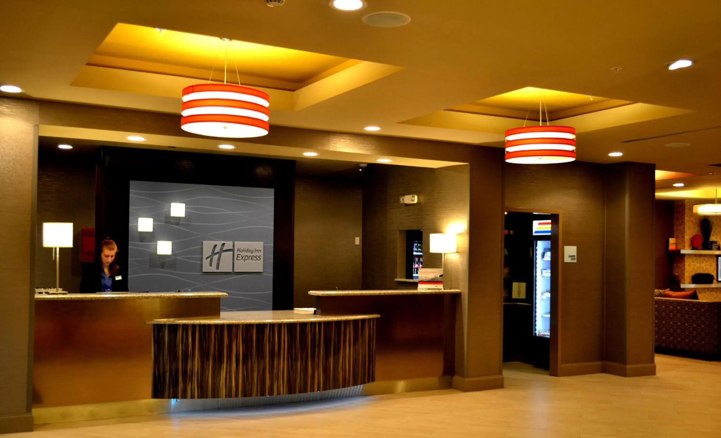Property building, Lobby/Reception in Holiday Inn Express Covington-Madisonville, an IHG Hotel