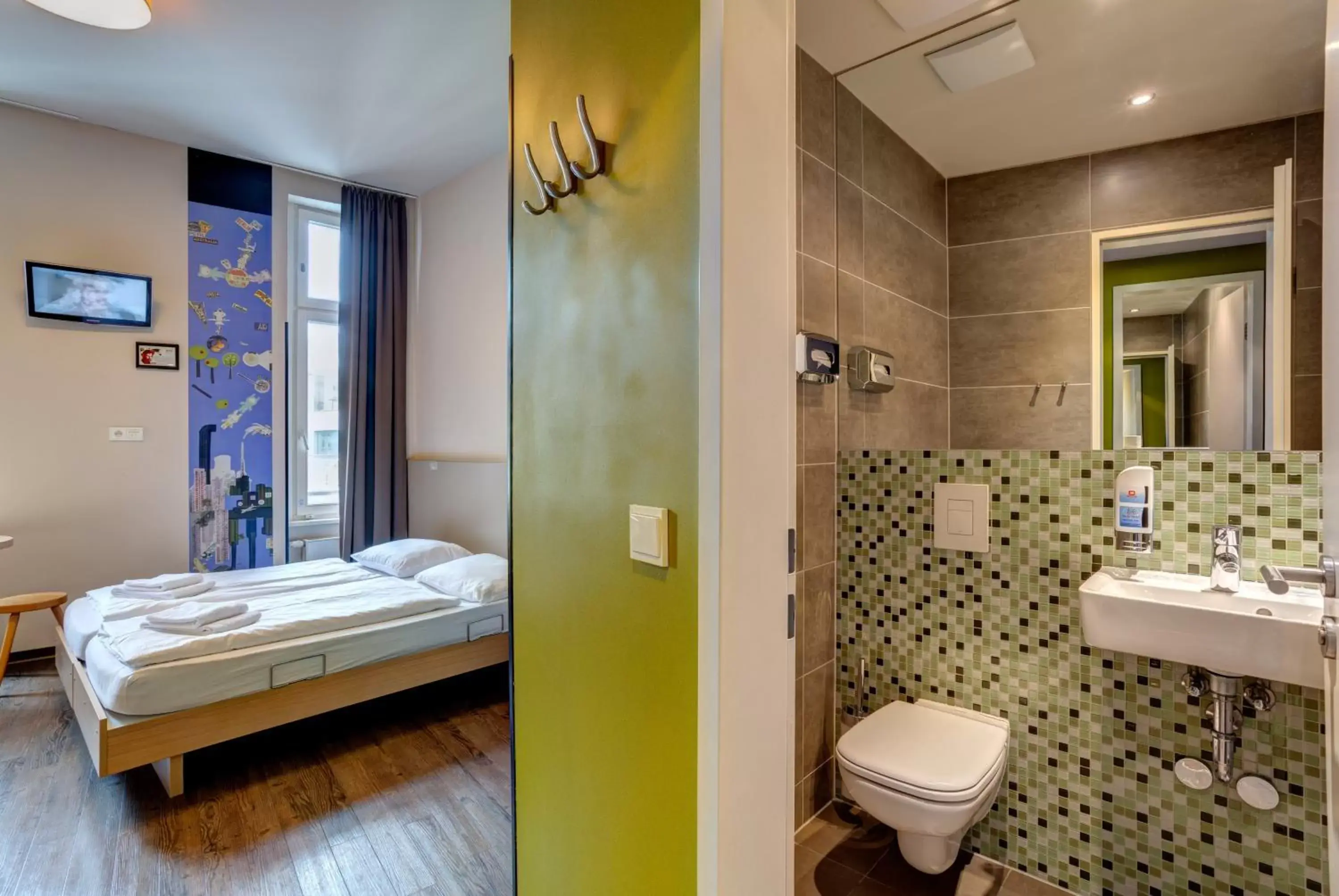 Toilet, Bathroom in MEININGER Hotel Berlin Mitte