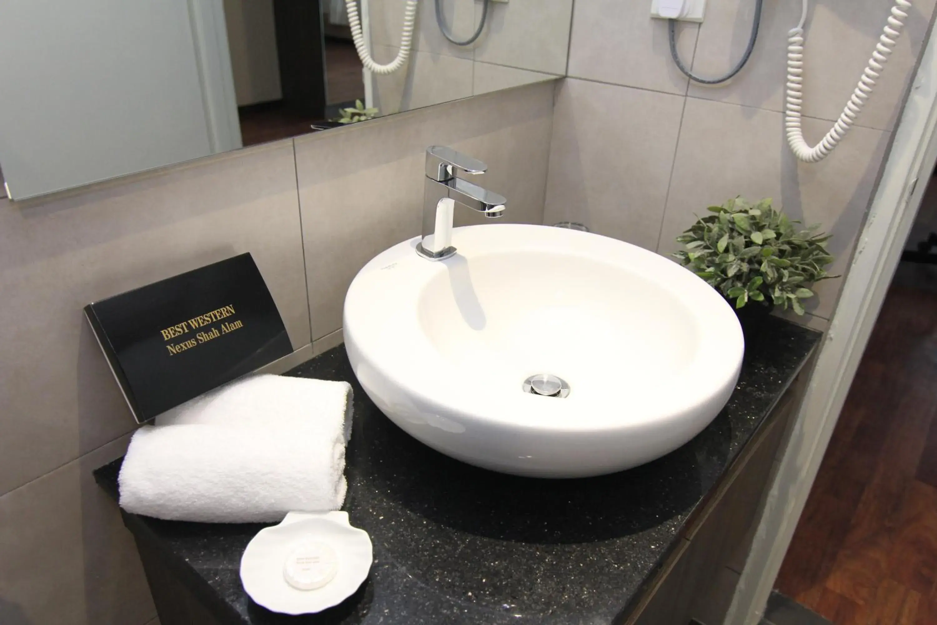 Bathroom in Nexus Business Suite Hotel