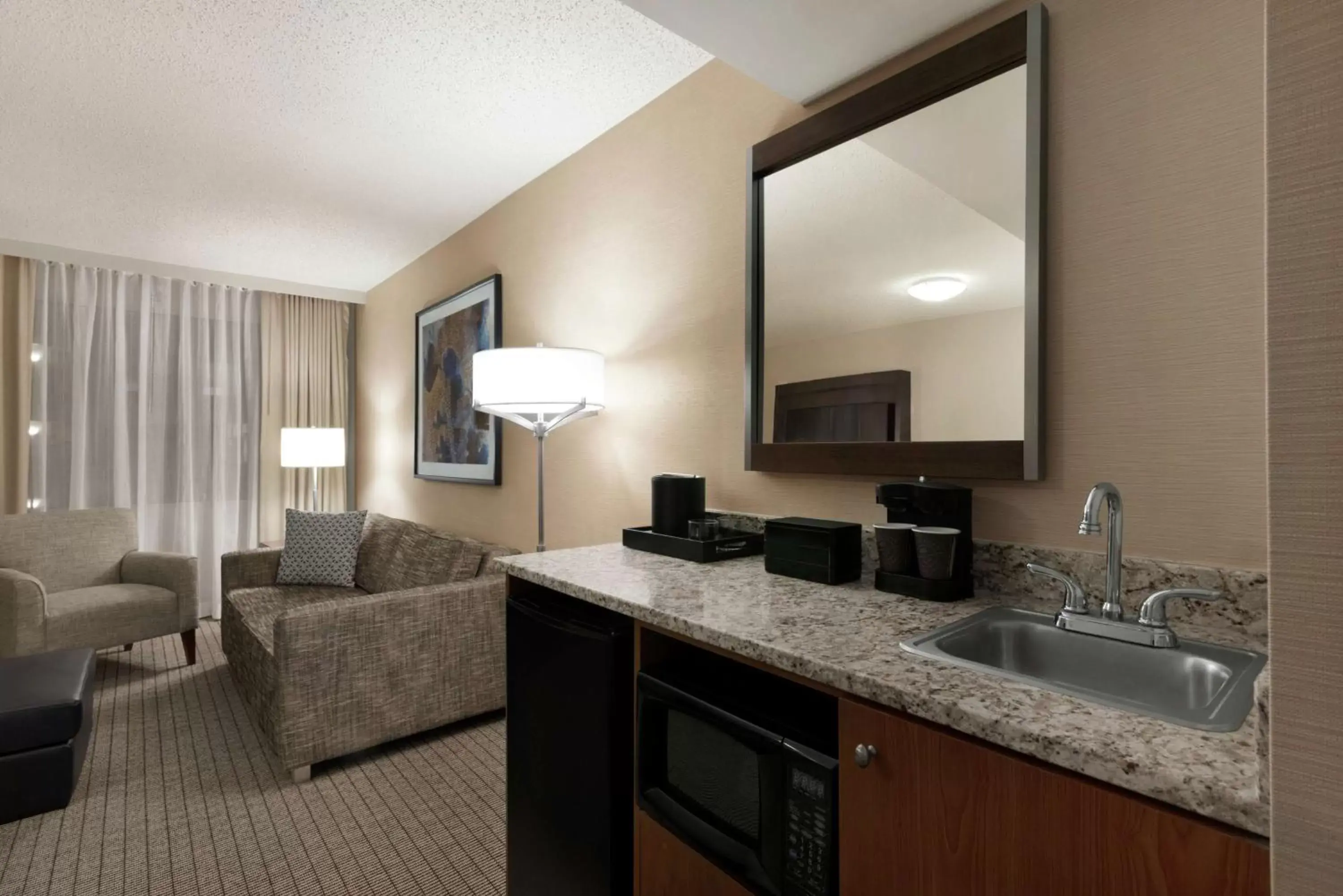 Bedroom, Kitchen/Kitchenette in Embassy Suites Cincinnati - RiverCenter