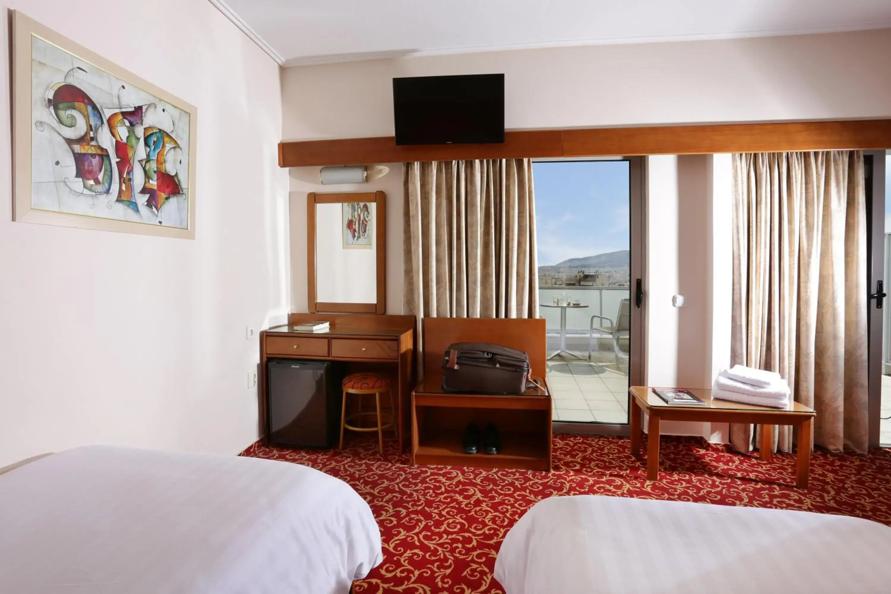Bedroom, TV/Entertainment Center in Xenophon Hotel