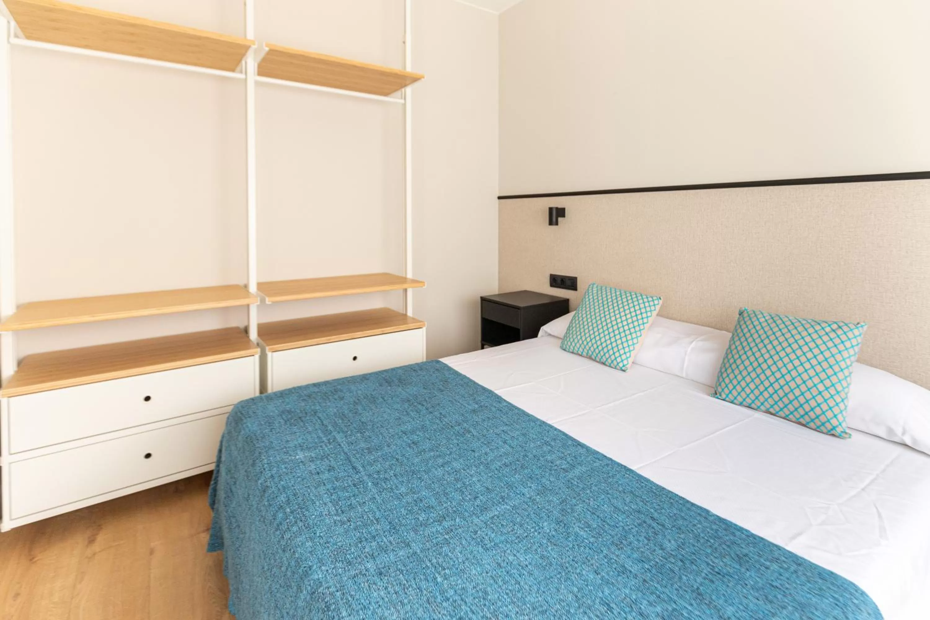 Bed in Atica Apartments - by Weflating