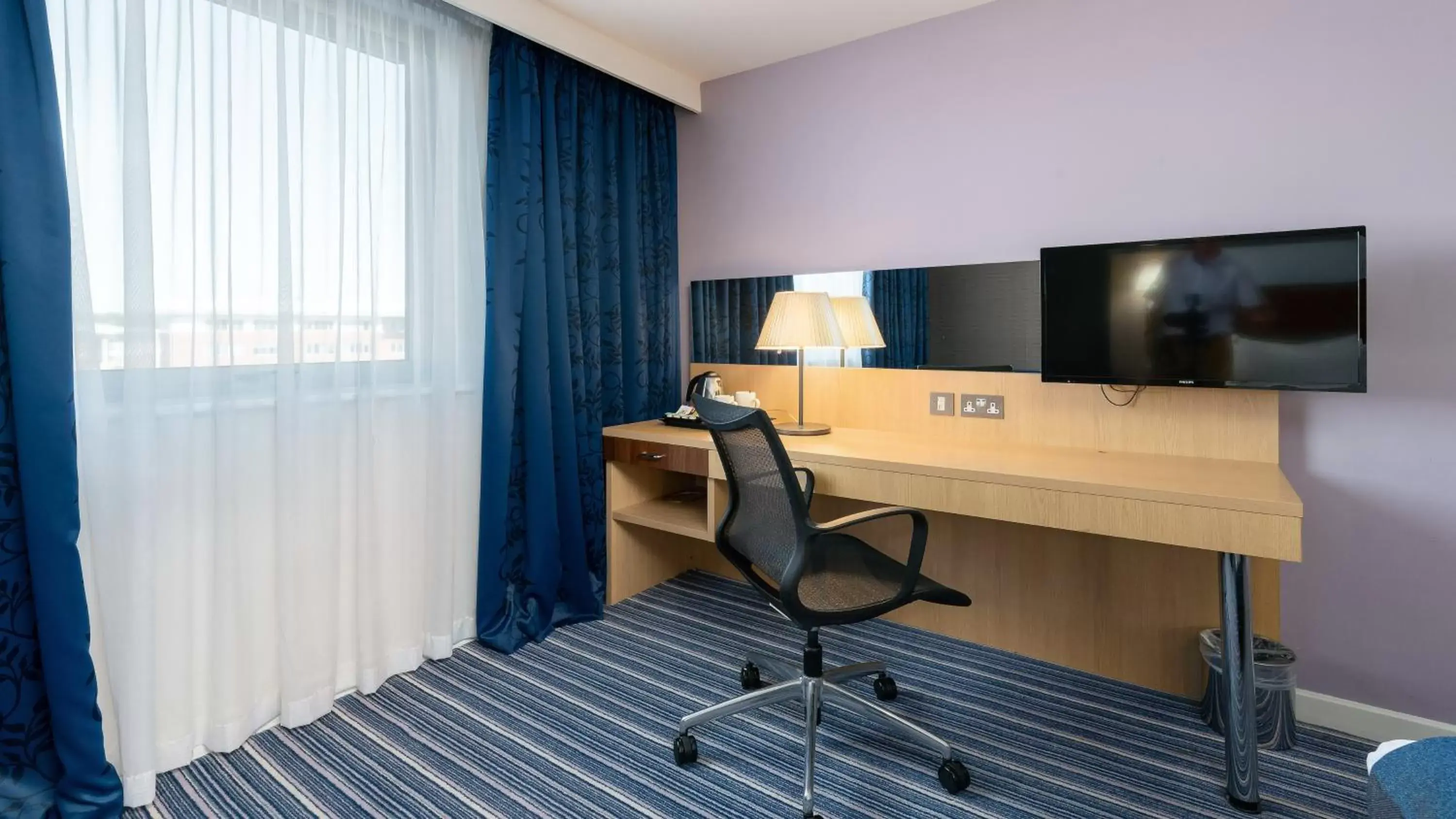 TV and multimedia, TV/Entertainment Center in Holiday Inn Express Leigh - Sports Village, an IHG Hotel