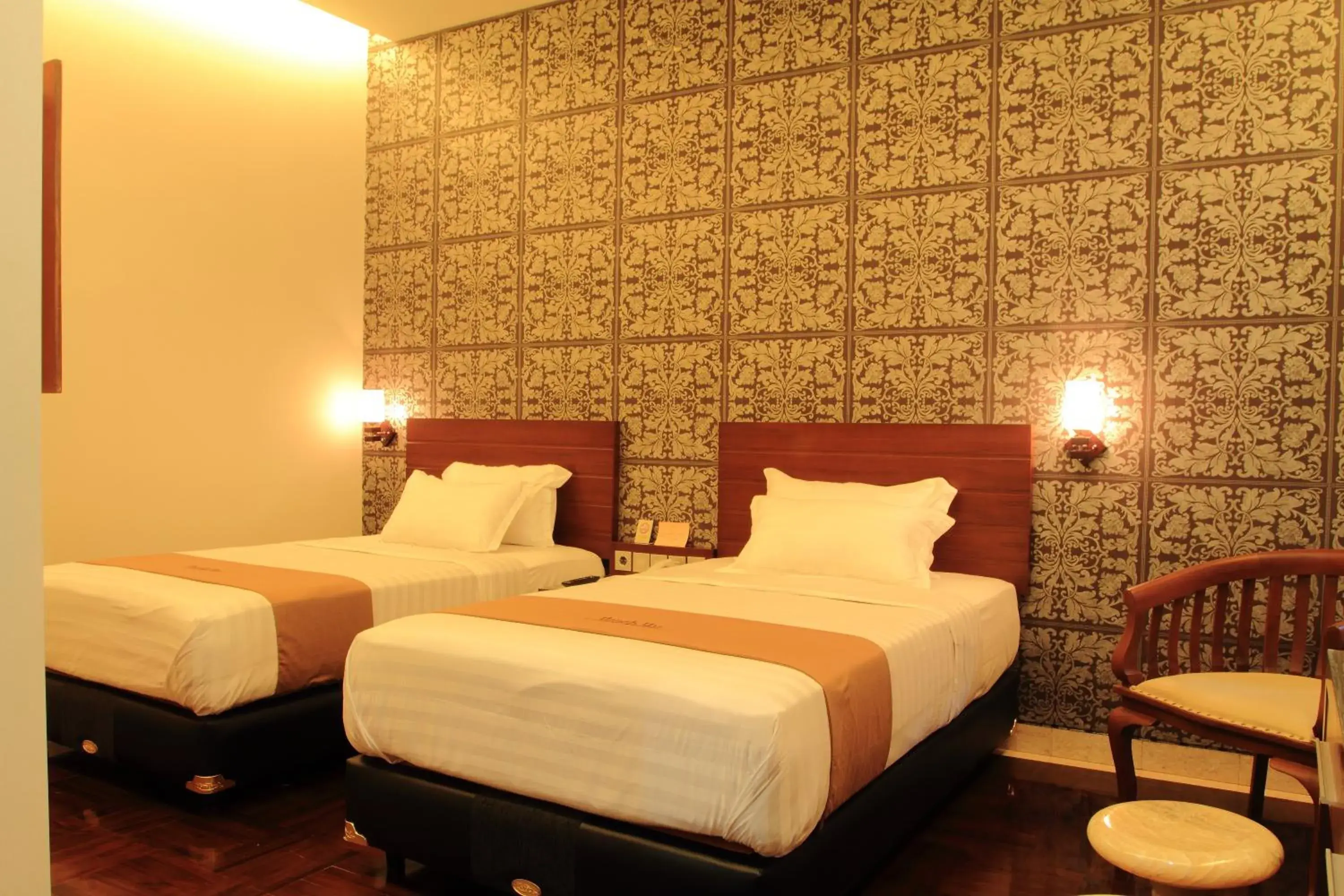Bed in Omah Qu Guesthouse Malioboro