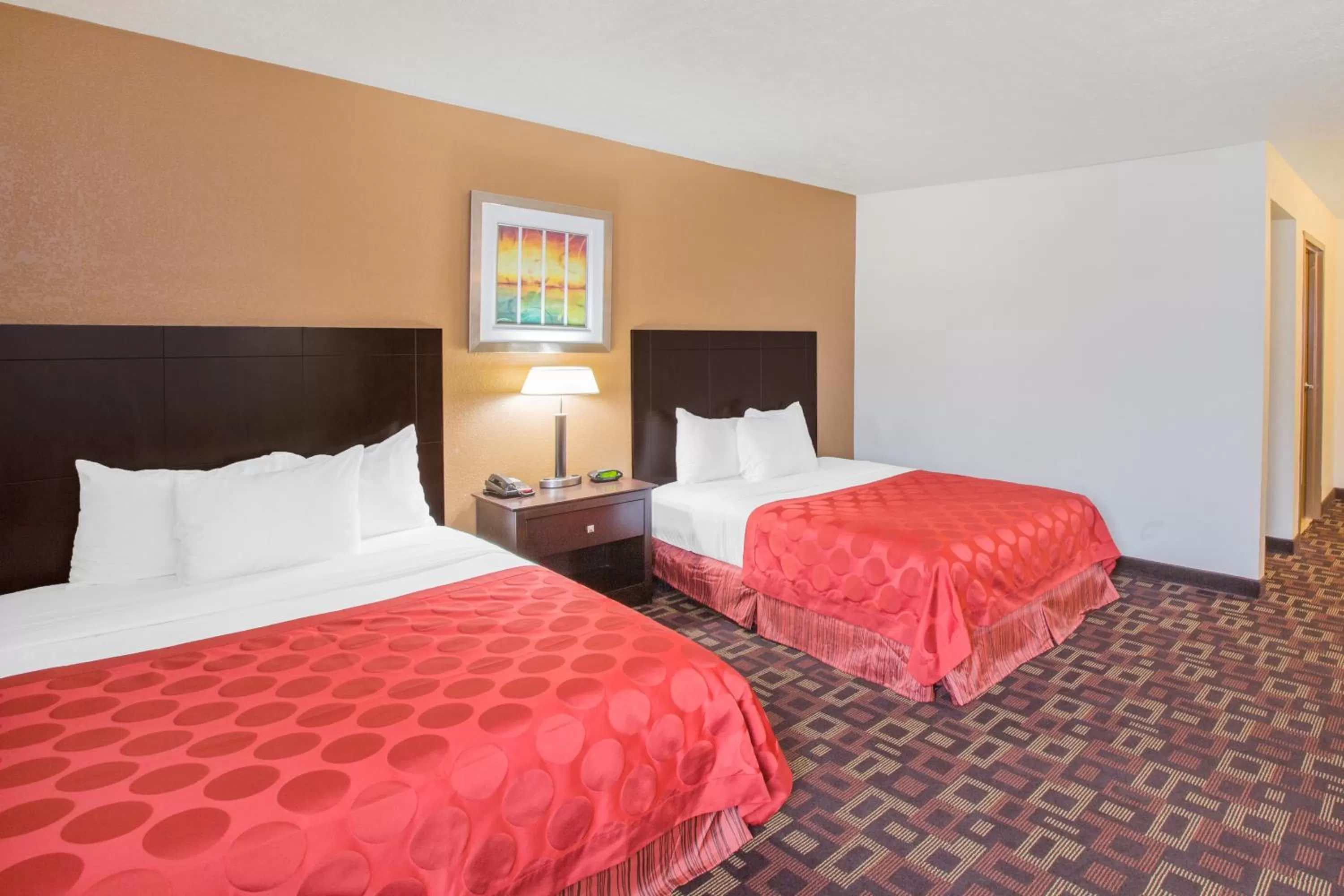 Bed in Ramada by Wyndham Tulsa